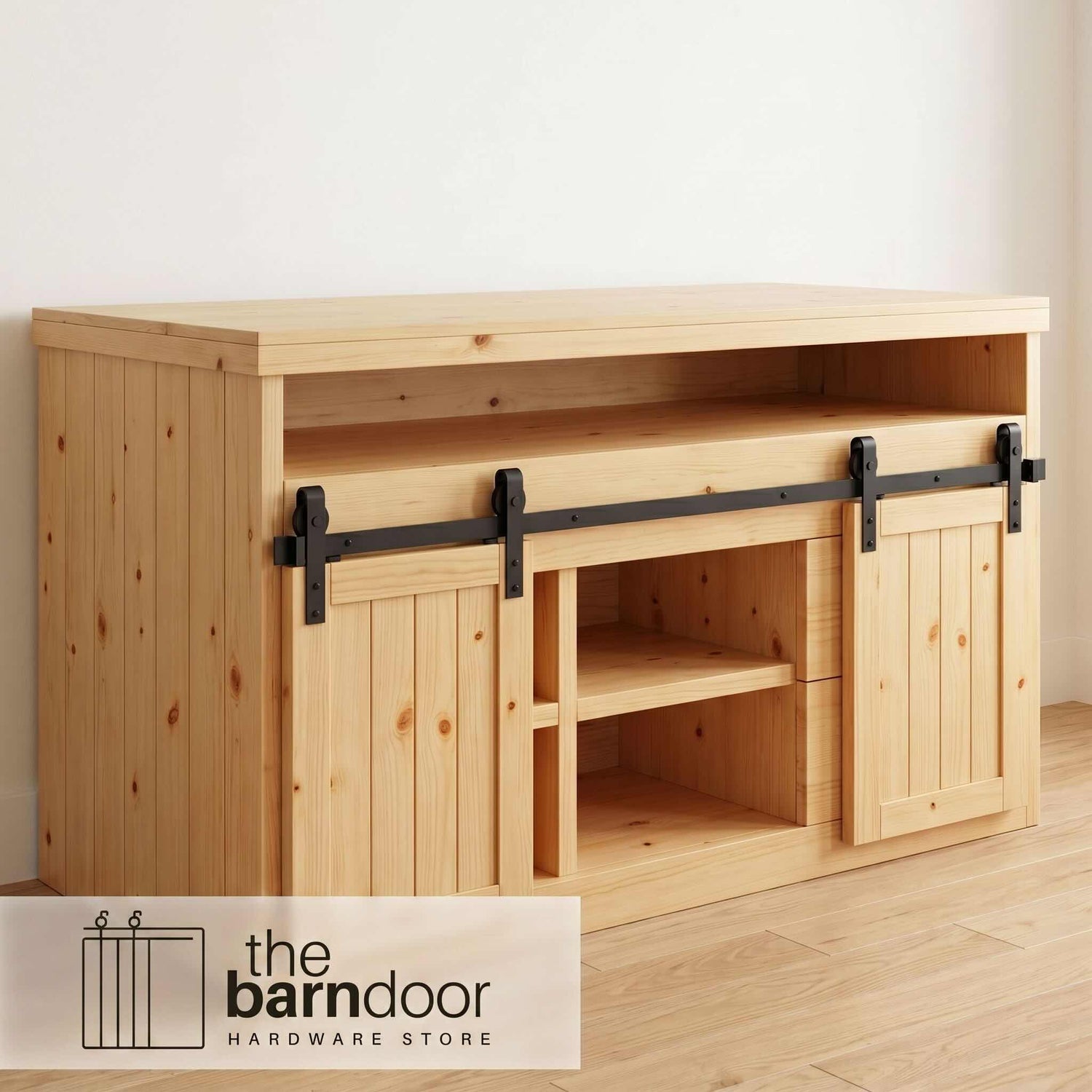 Classic J-Strap cabinet barn door hardware kit in a matte black finish, mounted on a small cabinet door.