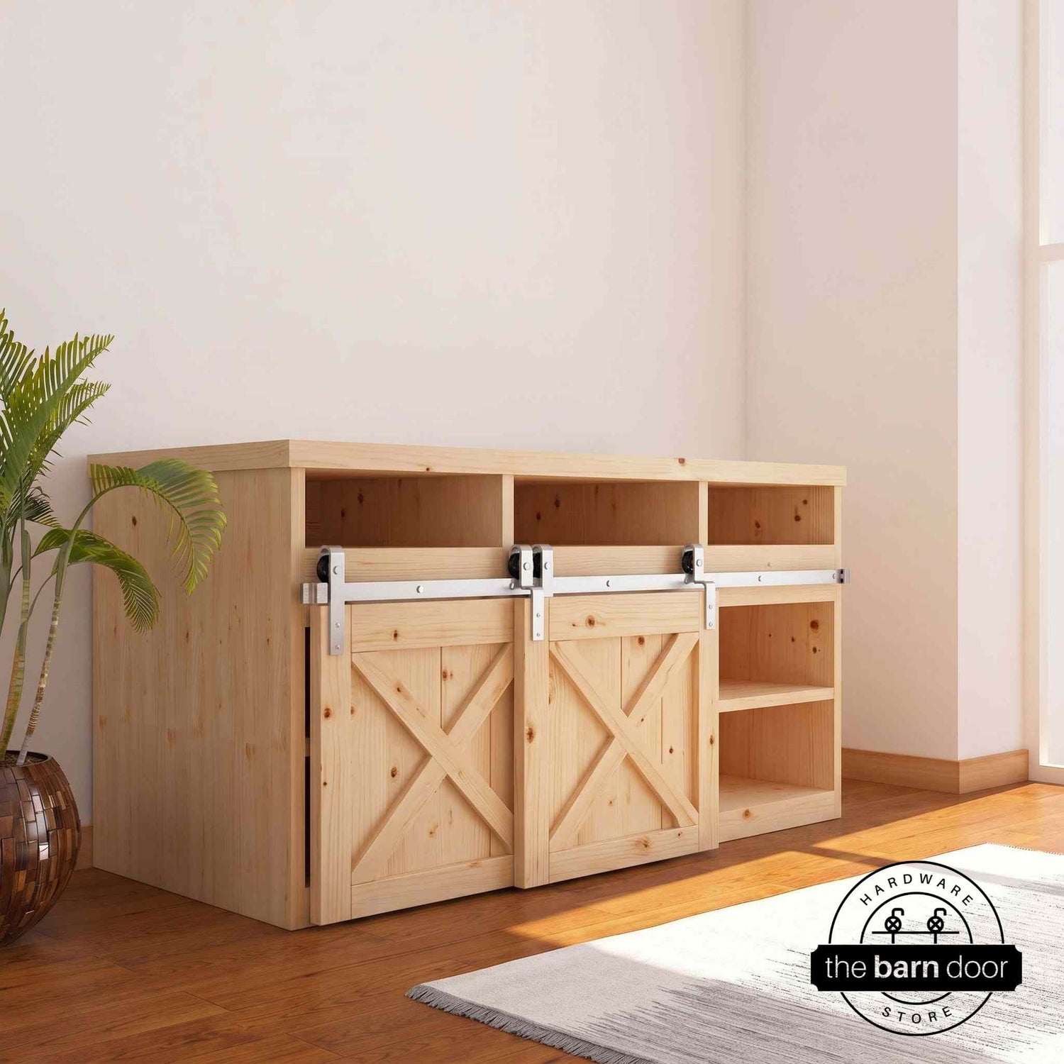 Brushed nickel J-Strap mini bypass cabinet barn door hardware kit on a single track, installed on a small two-door wooden cabinet.