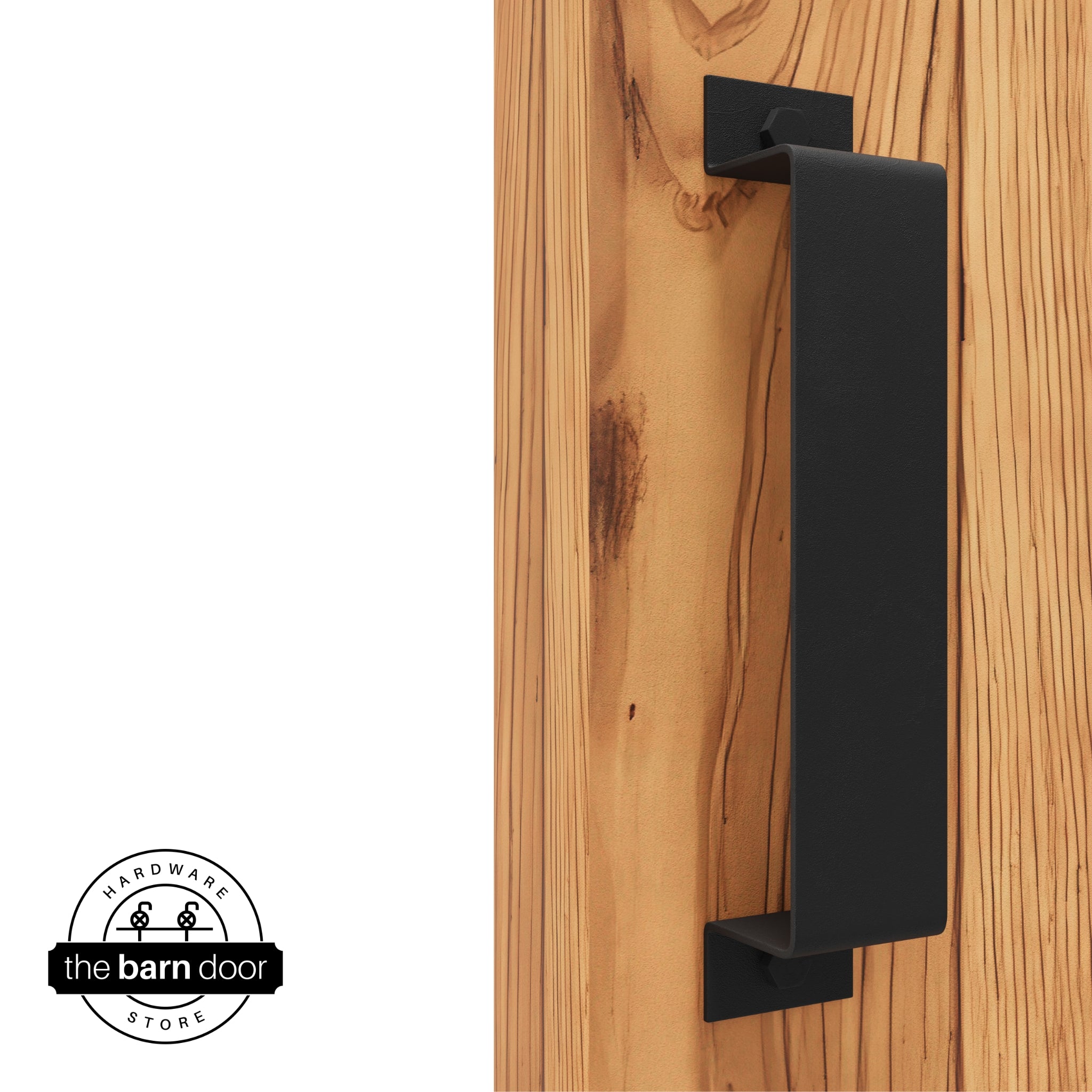A matte black, arch-shaped barn door handle is mounted on a light-colored wooden door with a vertical grain pattern.