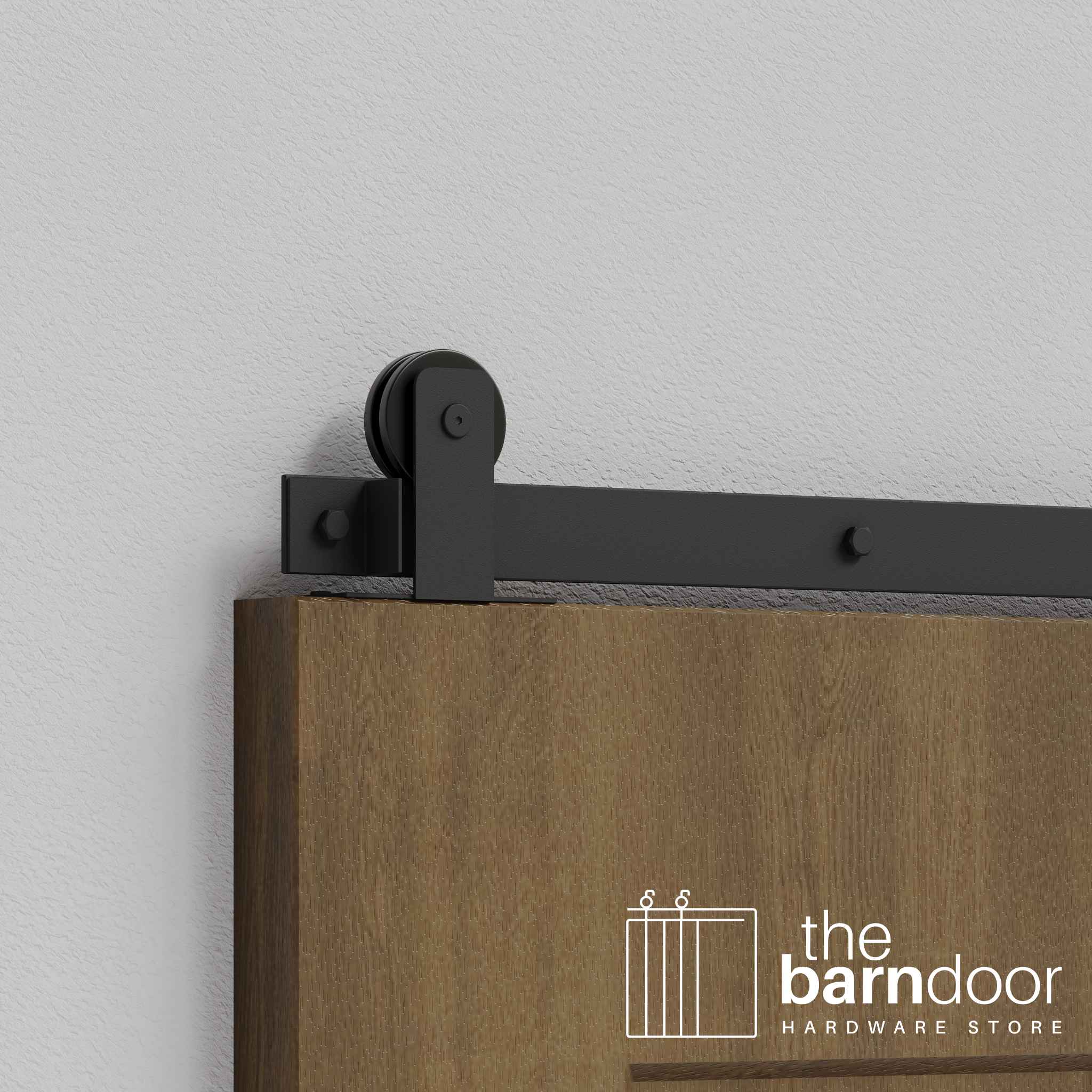 Close-up of Matte Black Straight Top Mount Single Track barn door hardware installed on a wooden door panel.