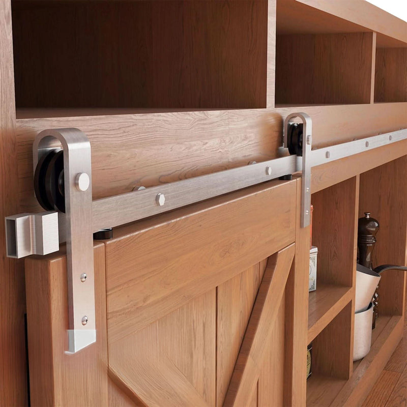 Classic J-Strap cabinet barn door hardware kit in a brushed nickel finish, mounted on a small cabinet door.