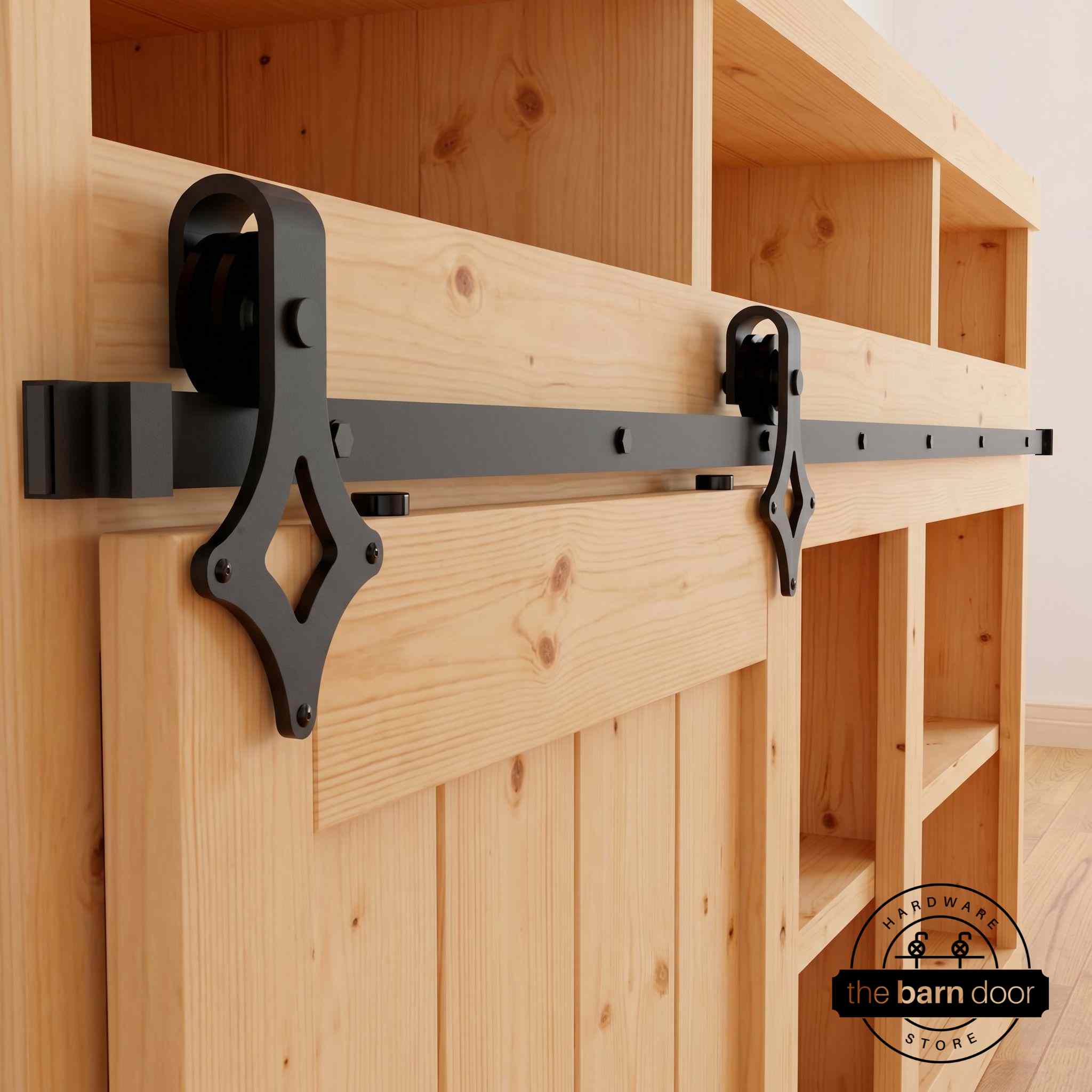 Diamond Mount cabinet barn door hardware kit in matte black with a single track, shown installed on a small wooden cabinet door.