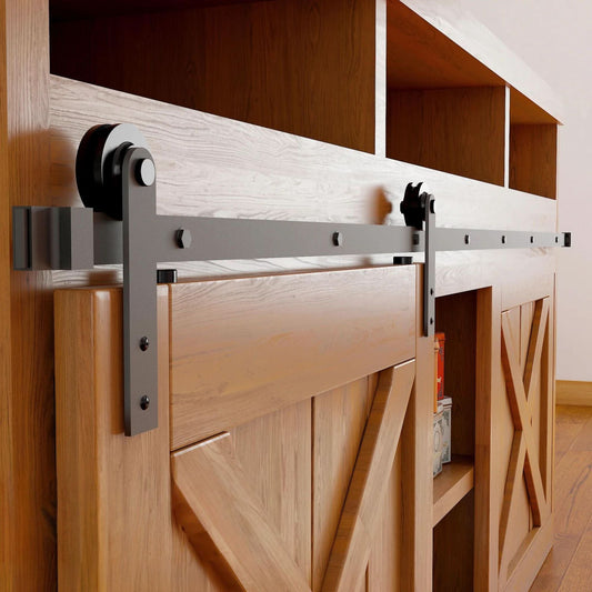 Straight Strap cabinet barn door hardware kit in a matte black finish, mounted on a small cabinet door.
