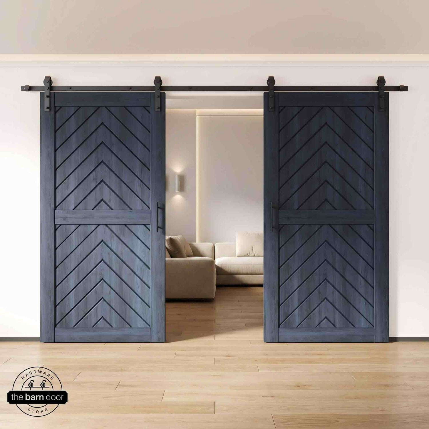 Navy wooden barn doors with a chevron pattern on a white wall background