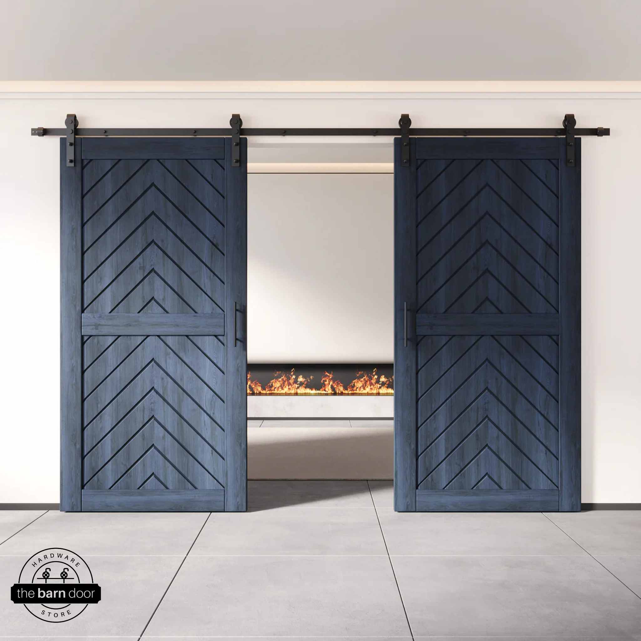 Navy wooden barn doors with a chevron pattern on a white wall background