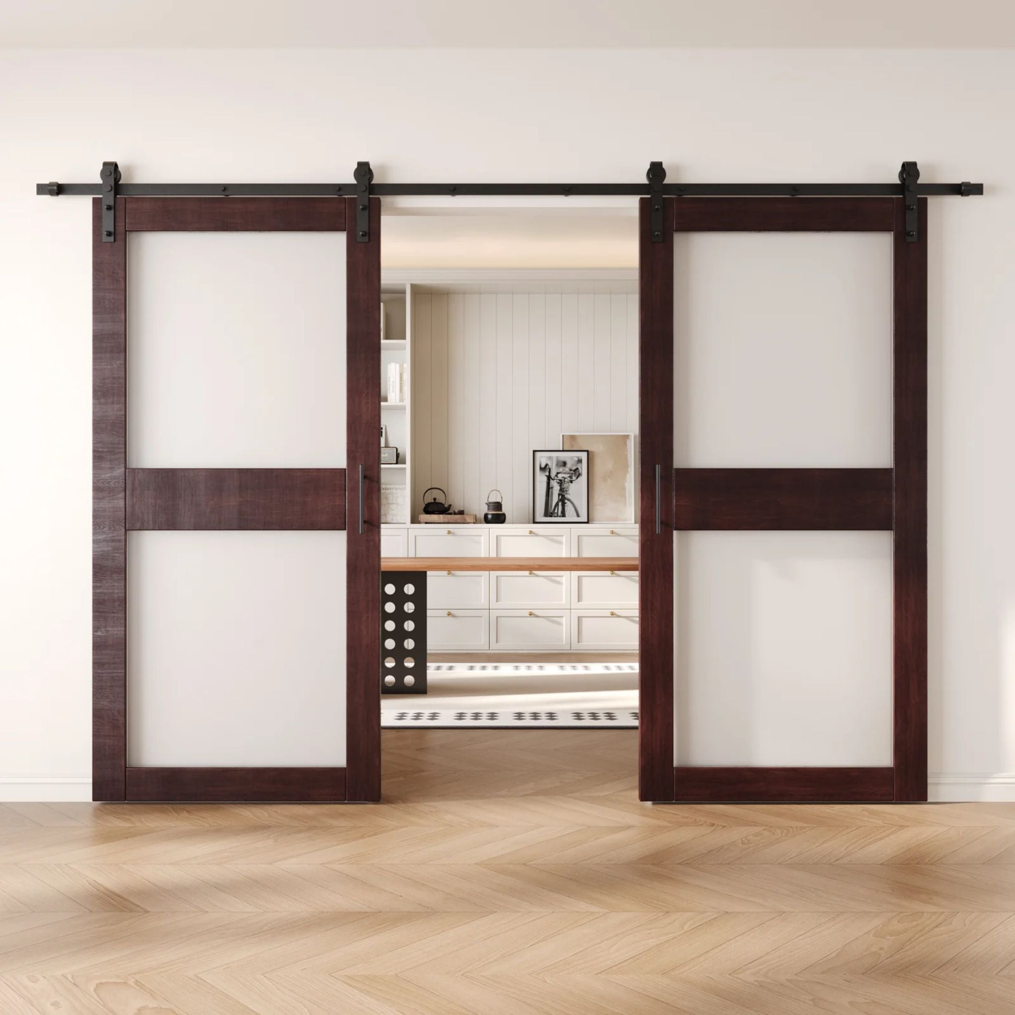 Red mahogany wooden sliding glass panel barn doors with black hardware in a modern interior setting.