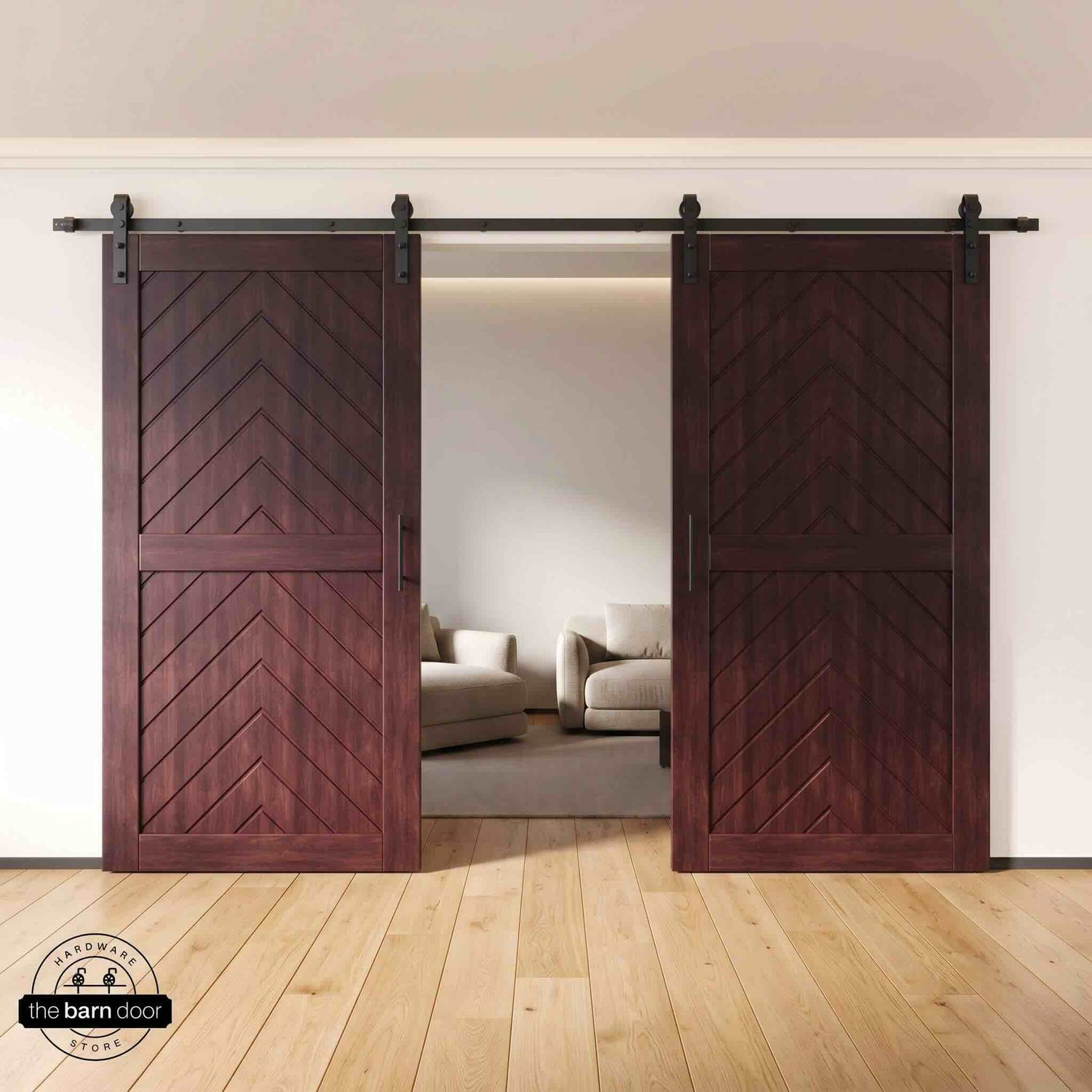 Red Mahogany wooden barn doors with a chevron pattern on a white wall background
