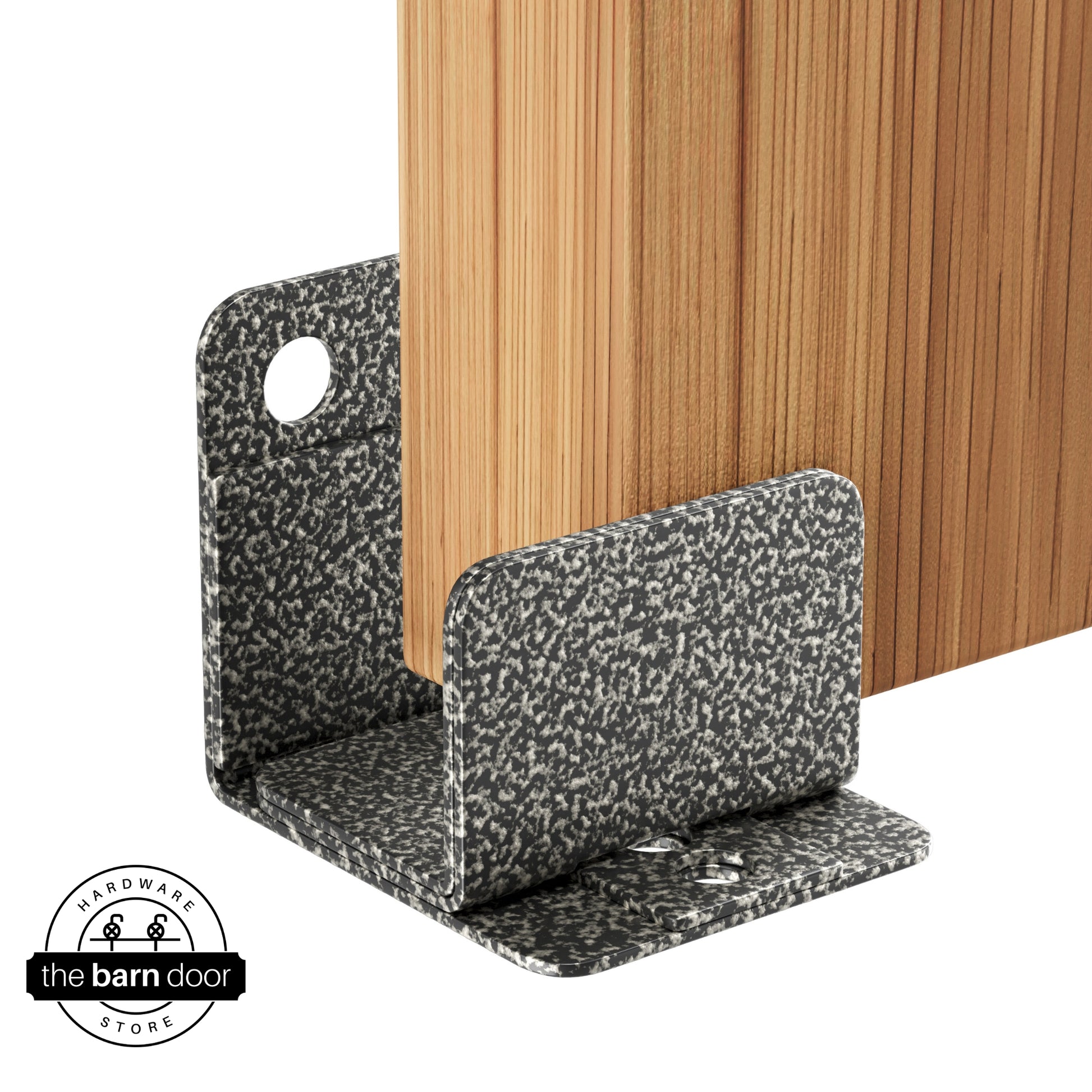 A silver vein U-shaped floor guide with a side plate, holding a light wood barn door in place.