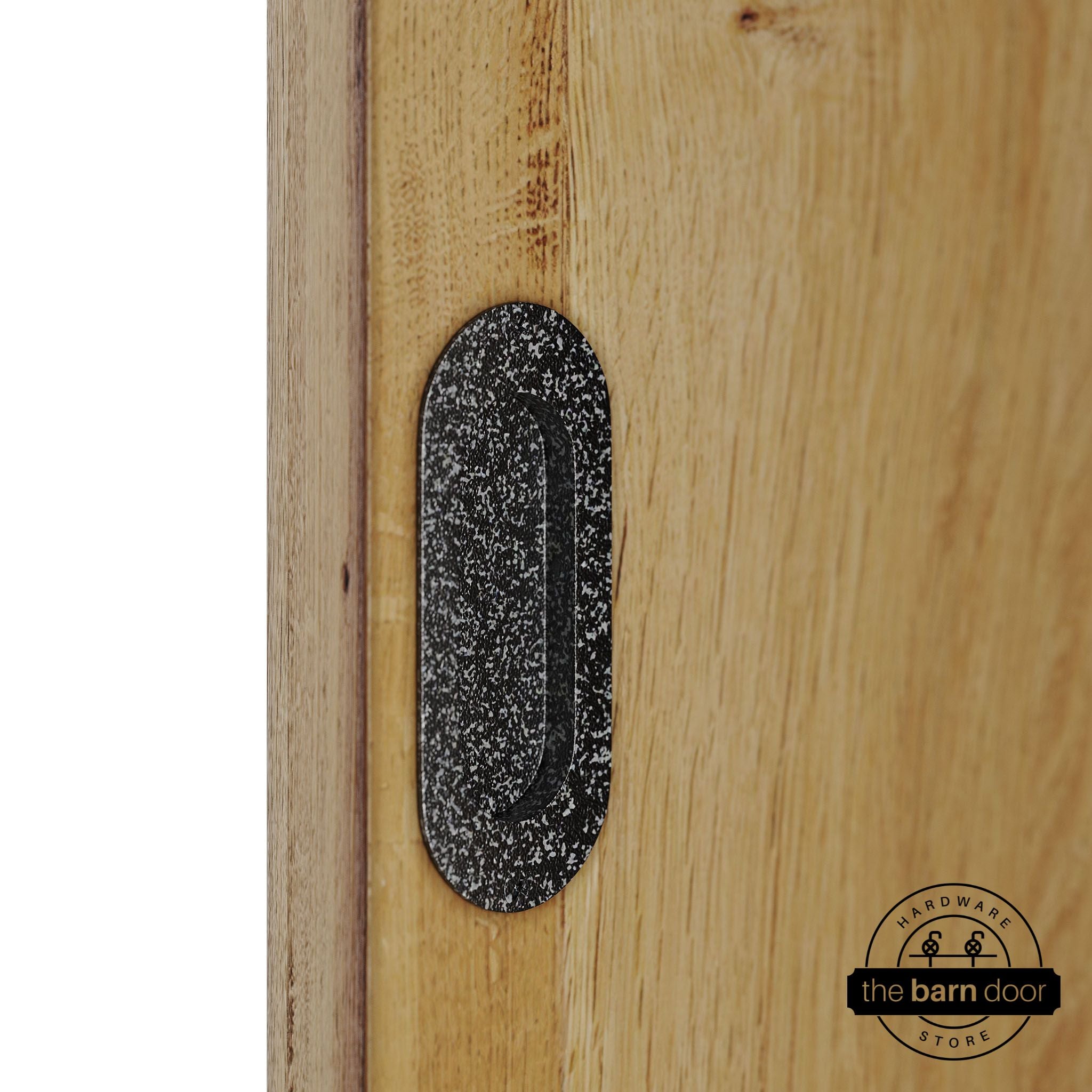 Wooden door with a silver vein flush pull handle.