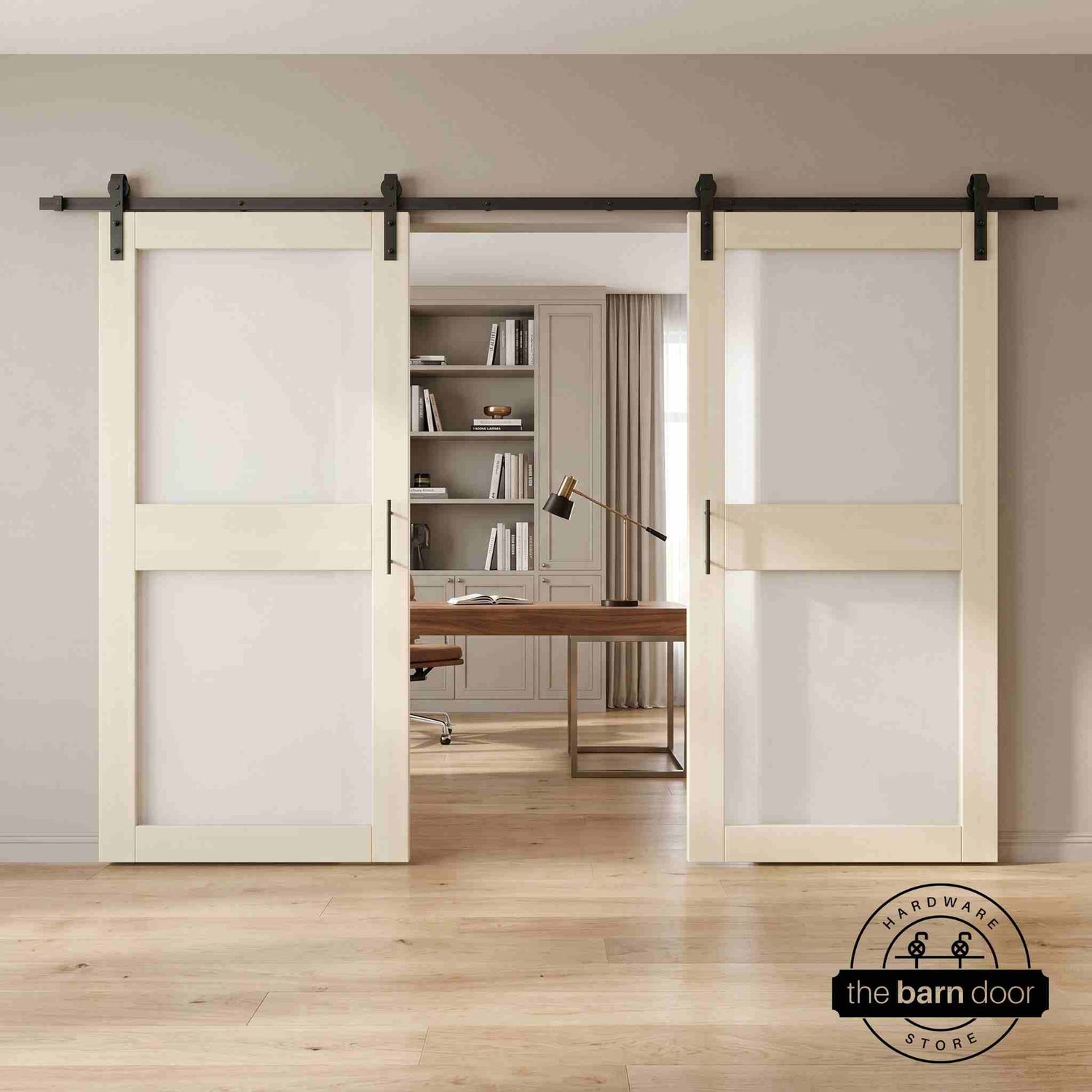 Tinsmith gray wooden sliding glass panel barn doors with black hardware in a modern interior setting.