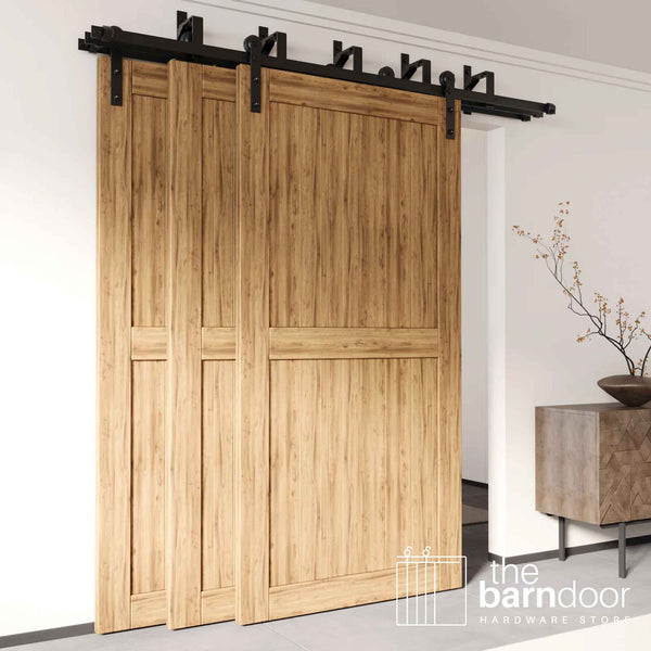 Straight Strap Triple Track Bypass Barn Door Hardware Kit in matte black, showing three barn doors on a multi-track system.