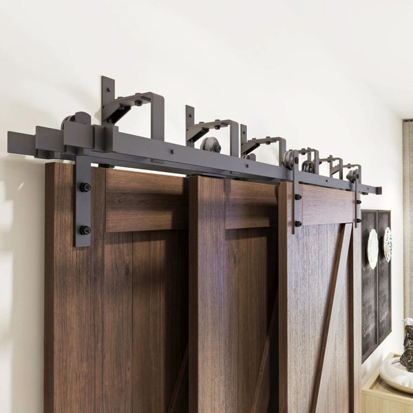 Straight Strap Triple Track Bypass Barn Door Hardware Kit in matte black, showing three barn doors on a multi-track system.