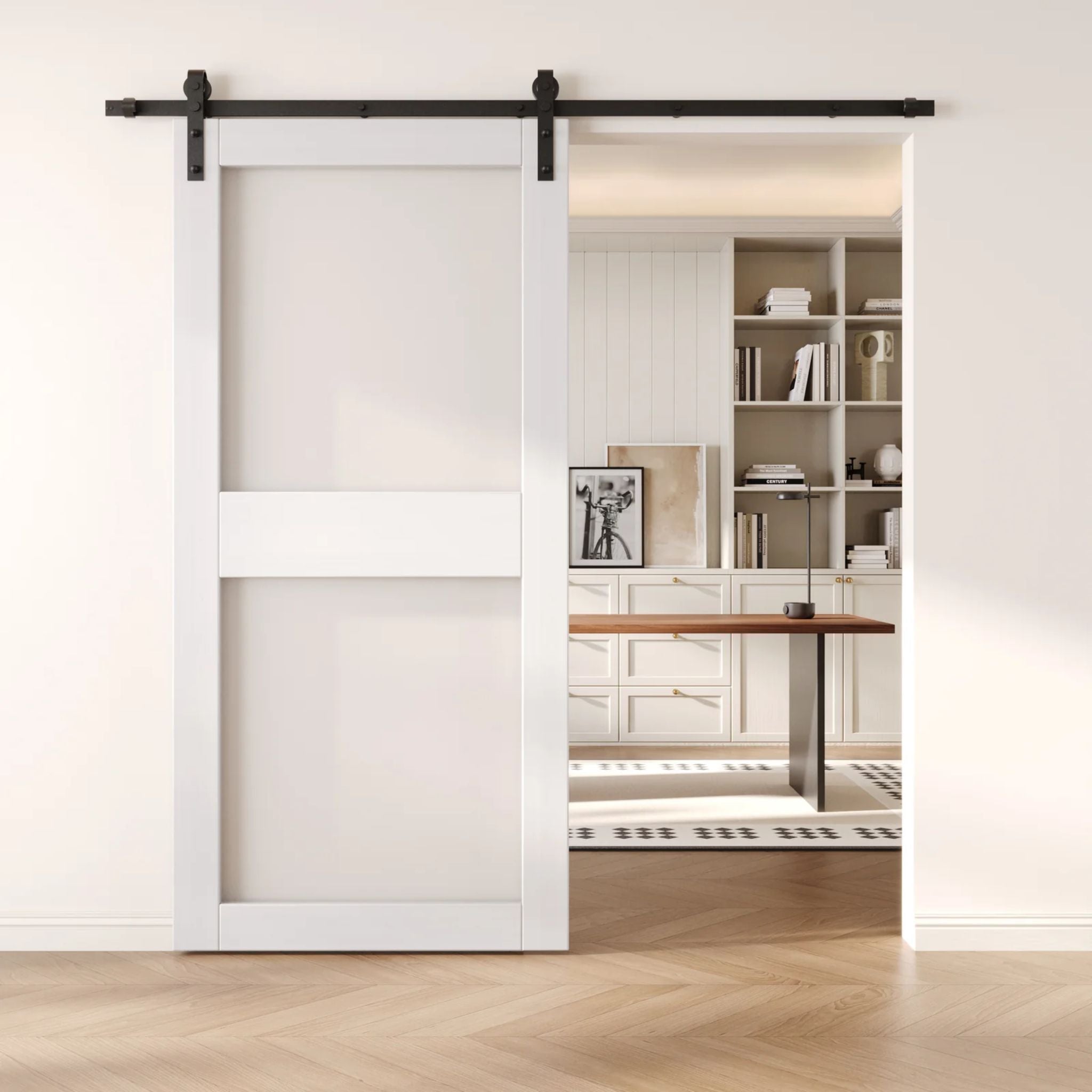 White sliding barn door with glass in a modern interior setting with a desk and shelves.