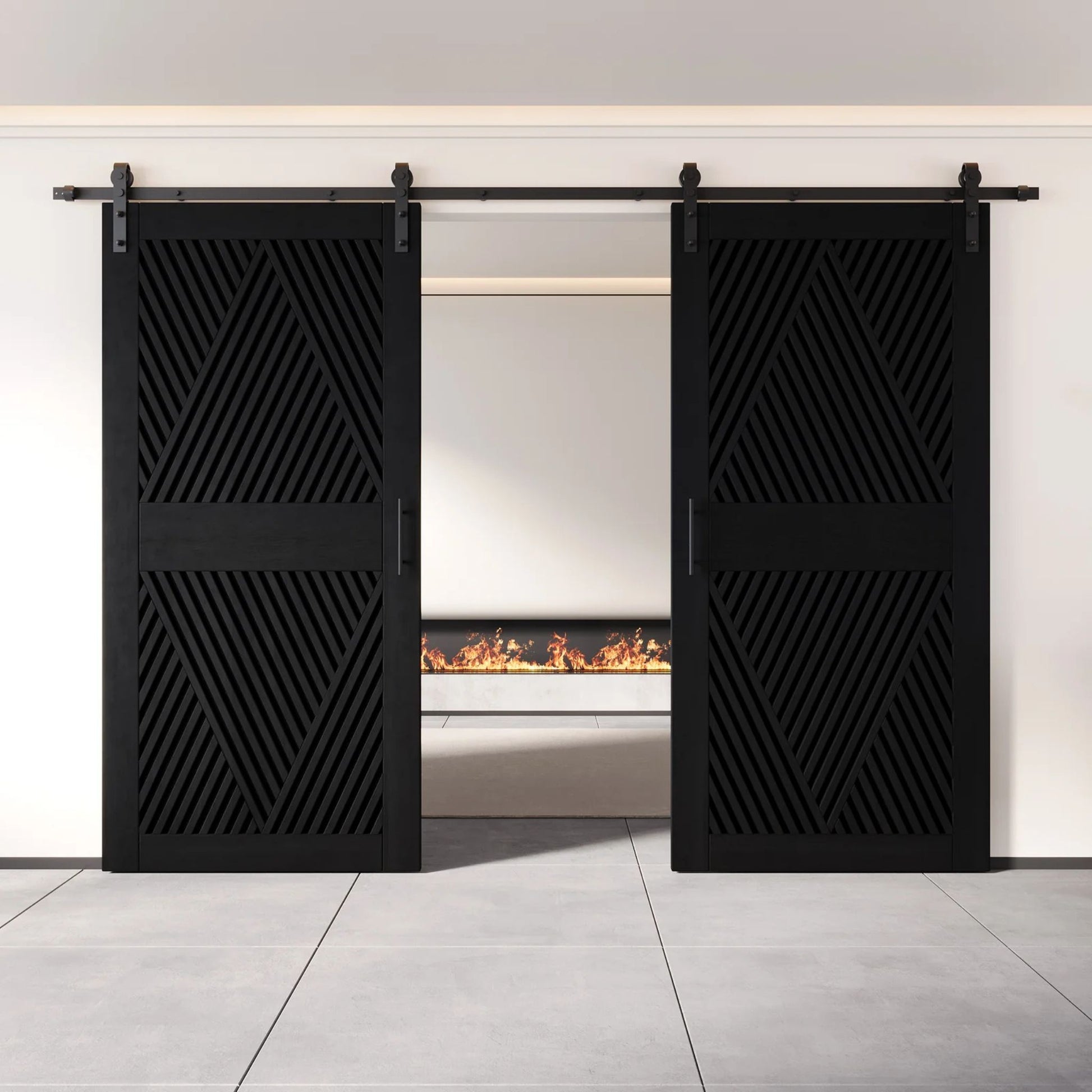 Two fully closed double barn doors in a black finish, featuring a bold, intricate diamond slat pattern. The doors are installed with black sliding hardware against a white wall, revealing a modern linear fireplace in the space behind them.