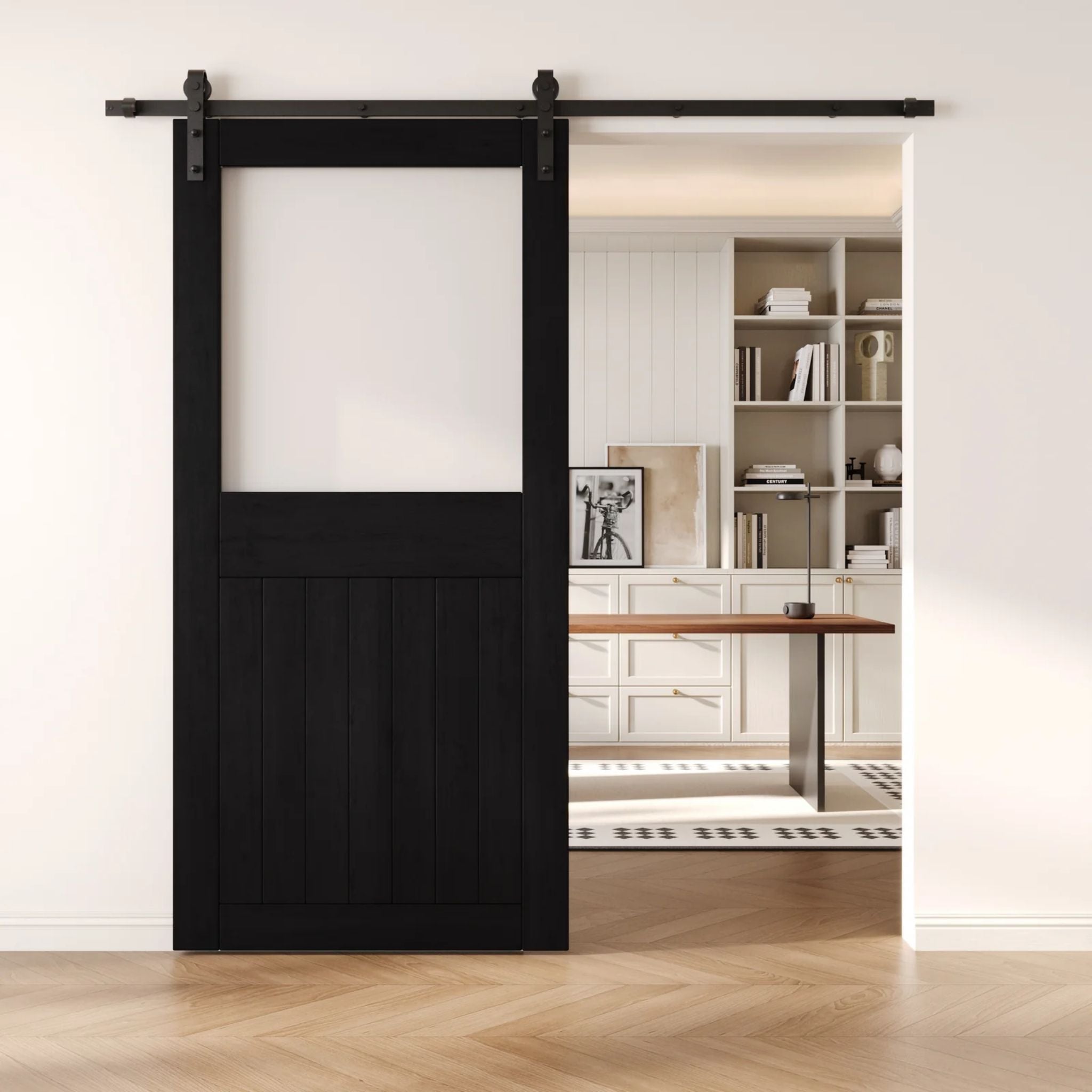 Black sliding half-lite frosted glass barn door in a modern interior setting with a desk and shelves.
