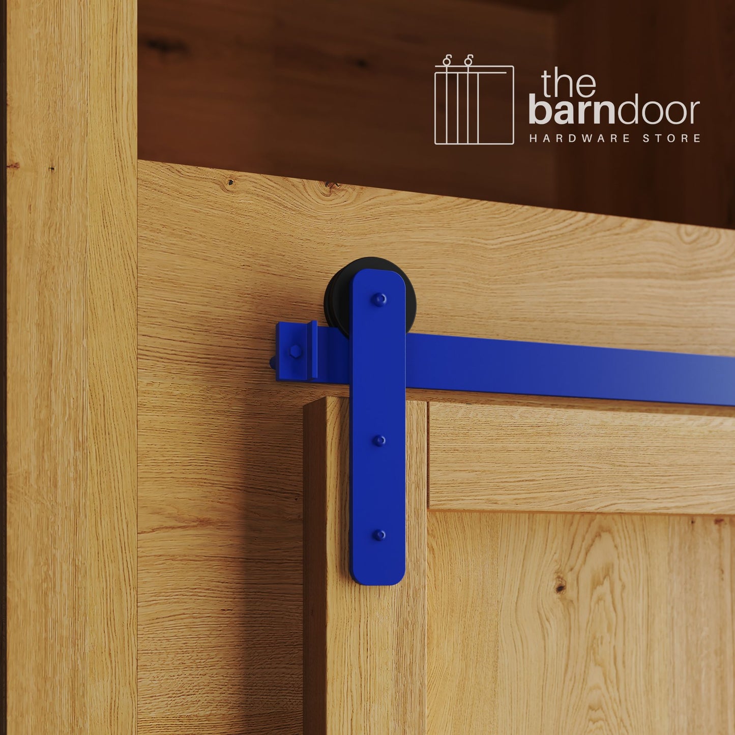 A close-up photograph of a natural oak cabinet with a sliding mini barn door, featuring a blue straight-strap hanger and a blue track system.