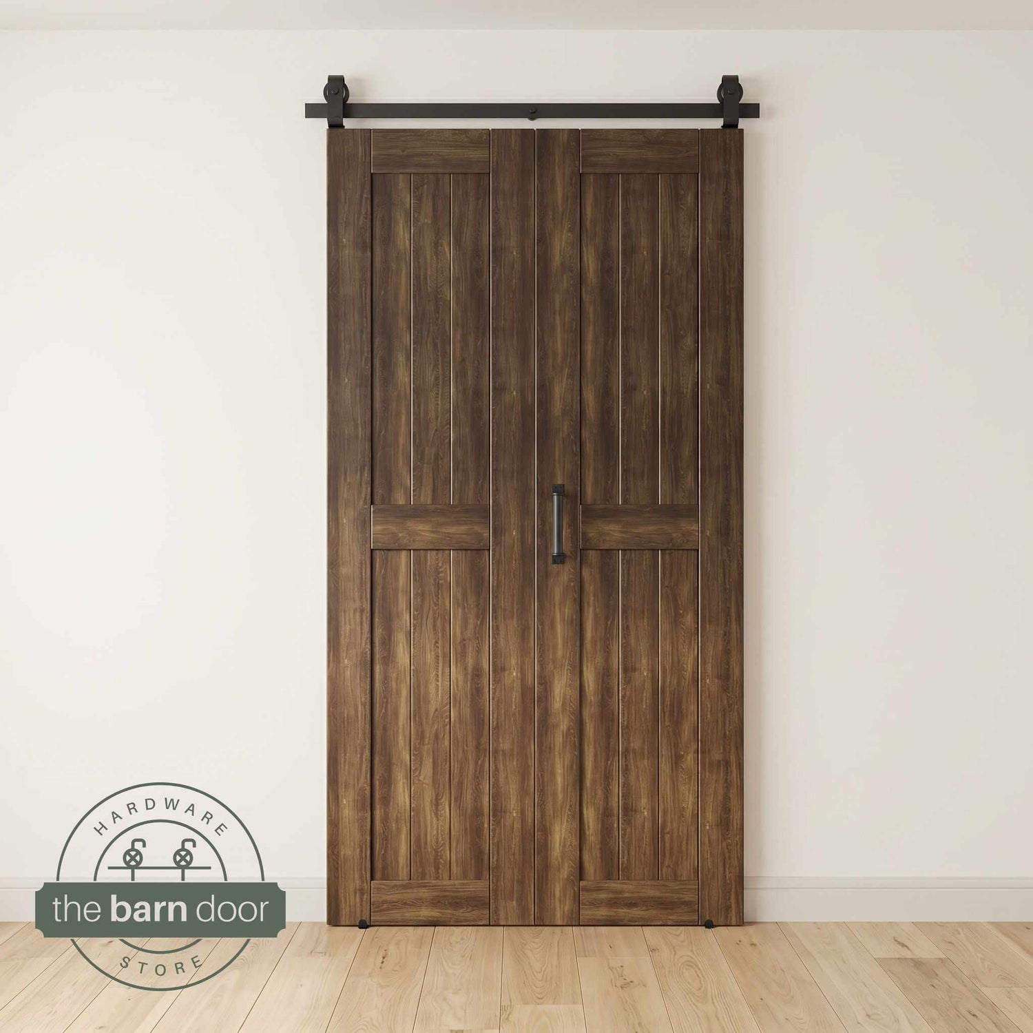Two-panel bifold barn door in Dark Walnut finish, installed and fully closed in a modern interior, showing the top-mount Matte Black track.
