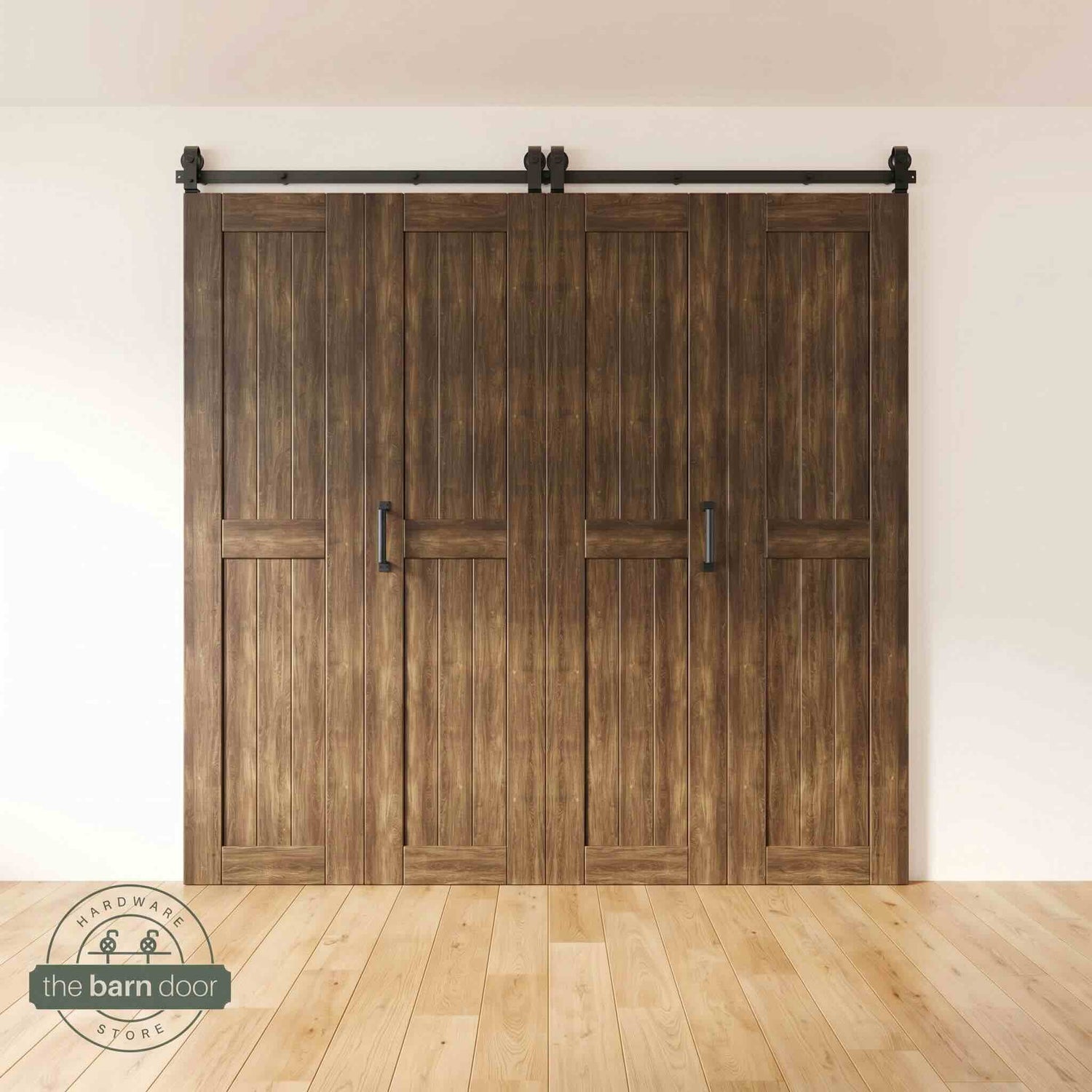 Four-panel bi-parting bifold barn door in a dark walnut finish, fully closed in a modern entryway, showing the top-mount Matte Black track.