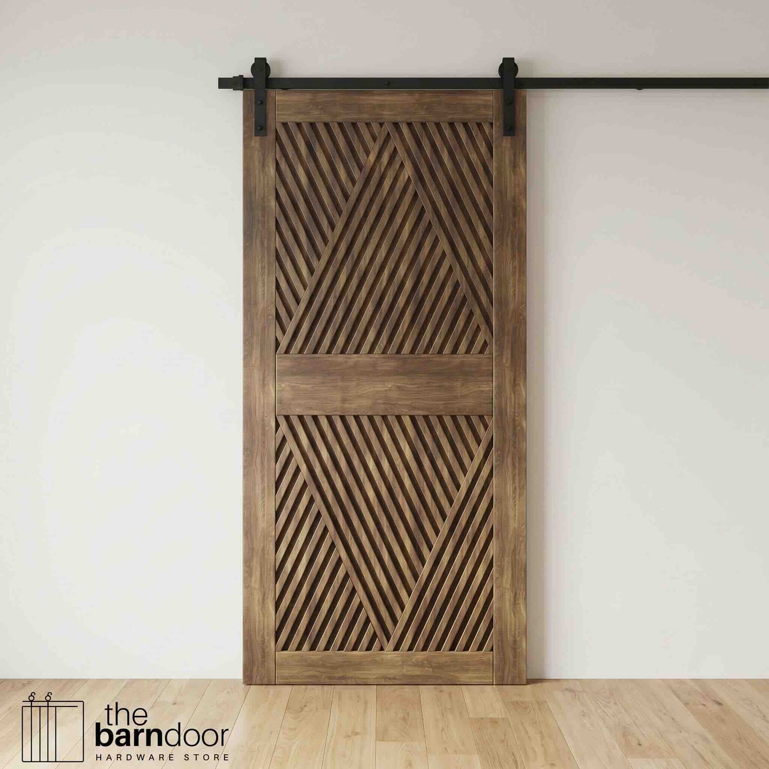 A modern dark walnut barn door with an intricate geometric diamond pattern installed on a black track in a contemporary living space with a fireplace.