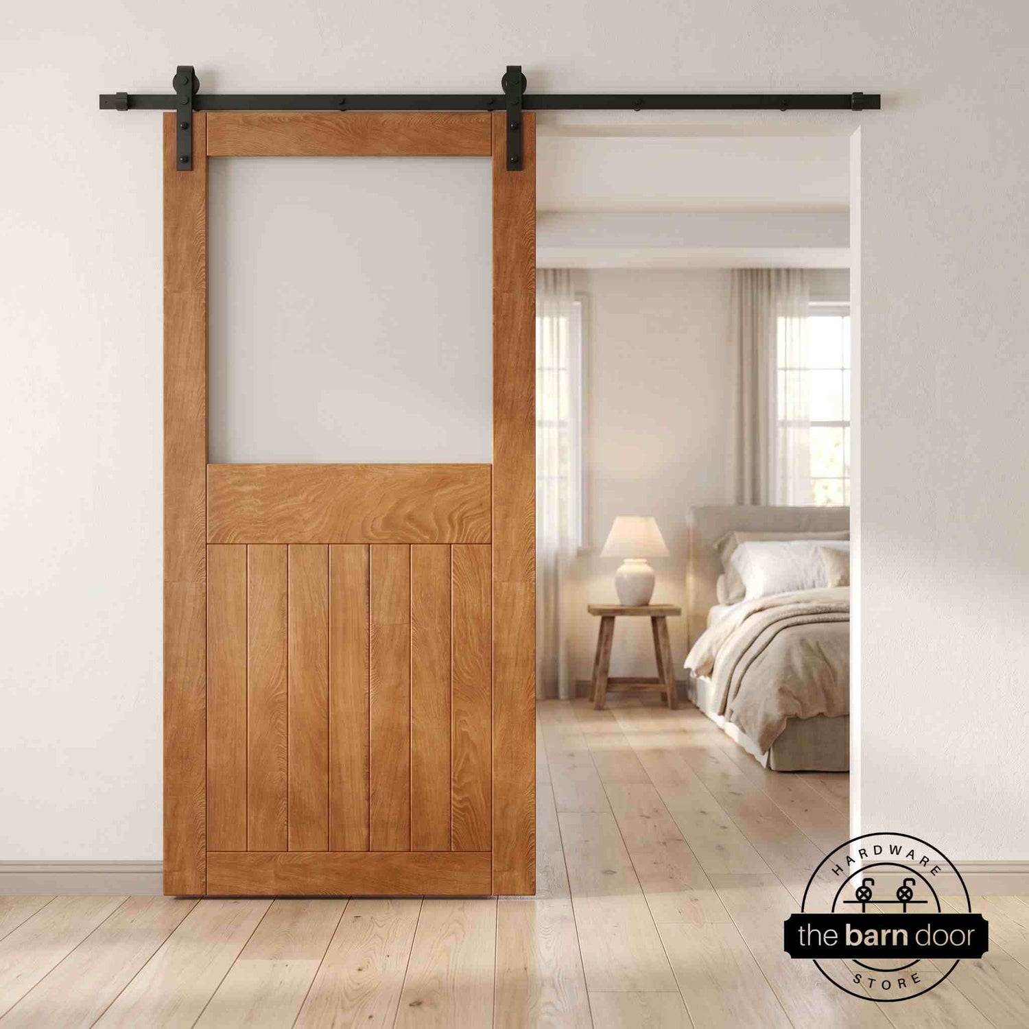 Early American sliding half-lite frosted glass barn door in a modern interior setting with a desk and shelves.