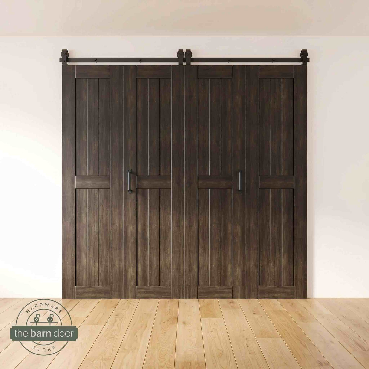 Four-panel bi-parting bifold barn door in a ebony finish, fully closed in a modern entryway, showing the top-mount Matte Black track.