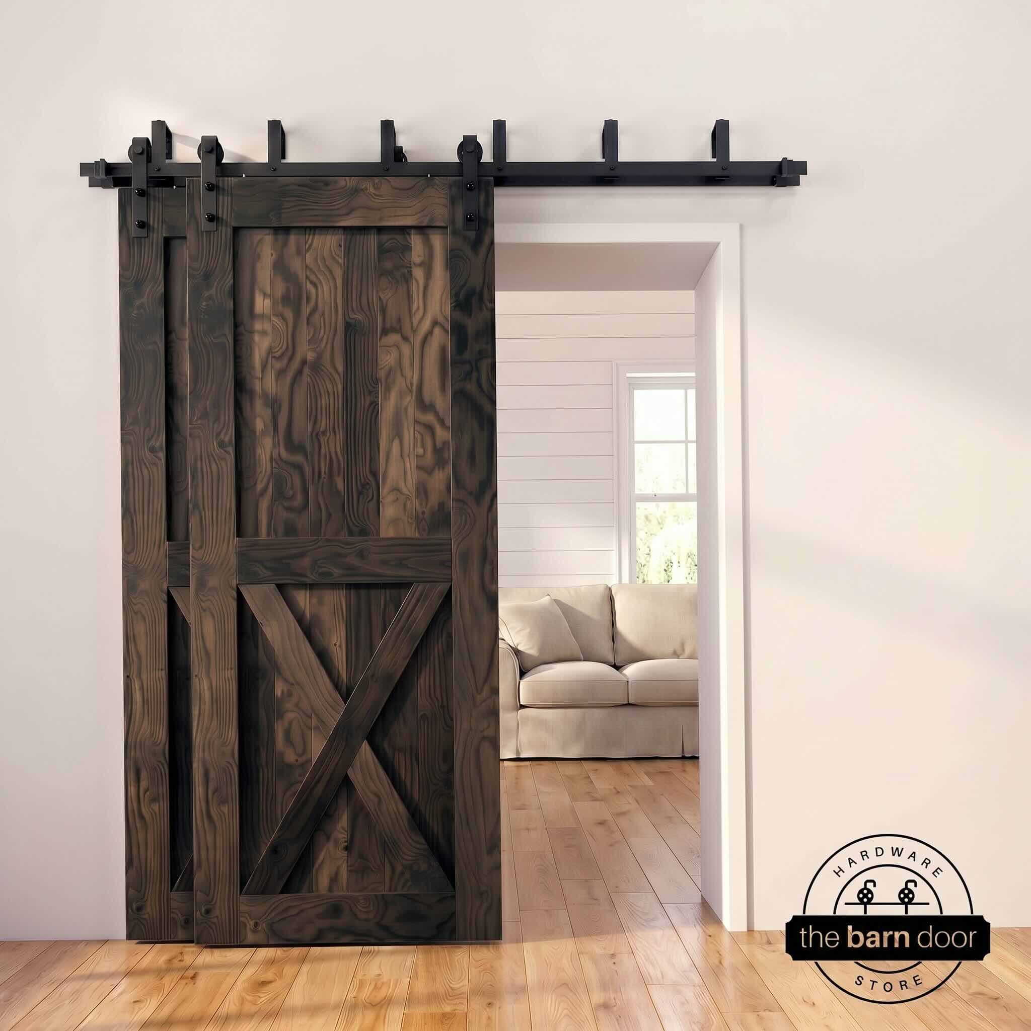 Ebony pine bypass barn door with  black hardware track, mounted over living room entryway