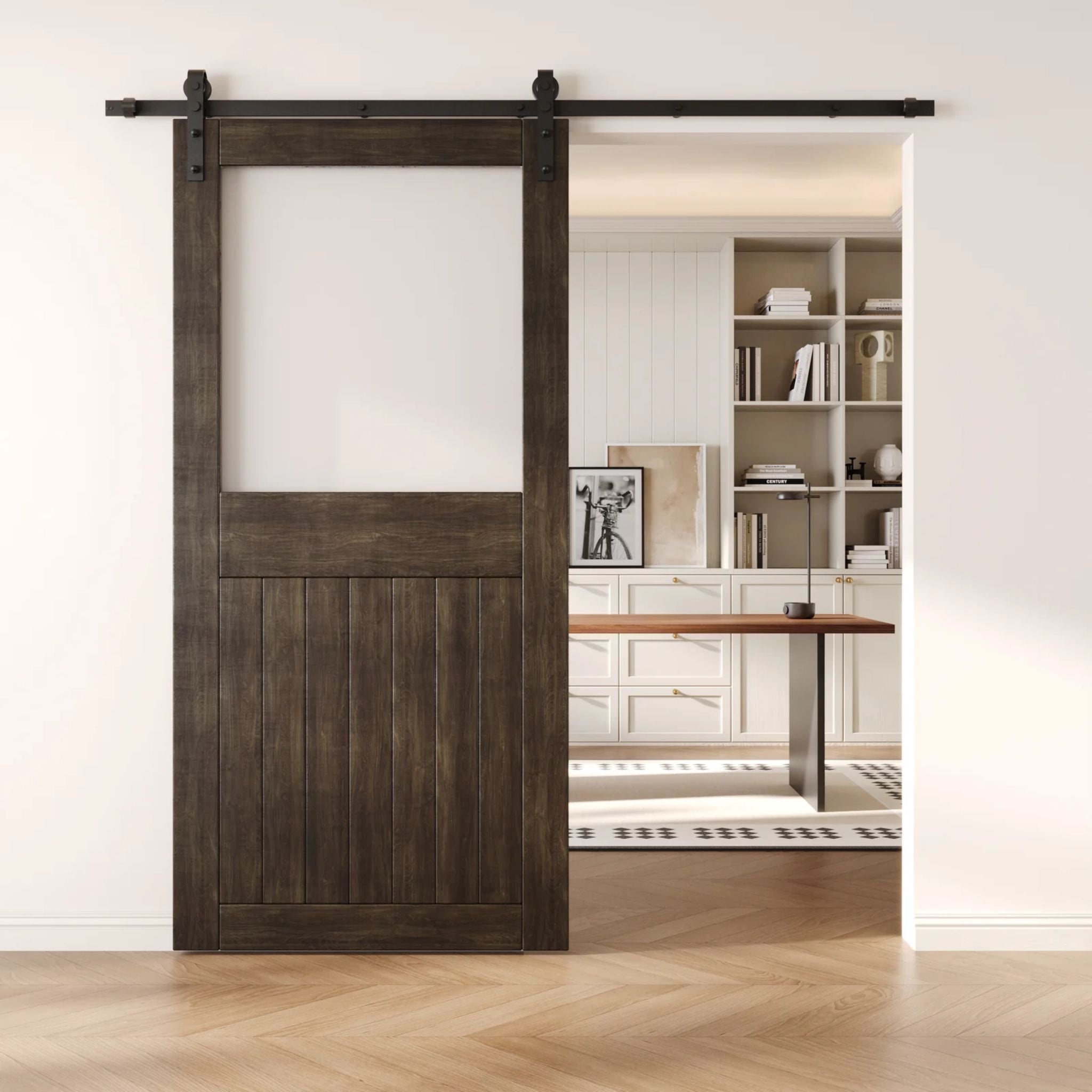 Ebony sliding half-lite frosted glass barn door in a modern interior setting with a desk and shelves.