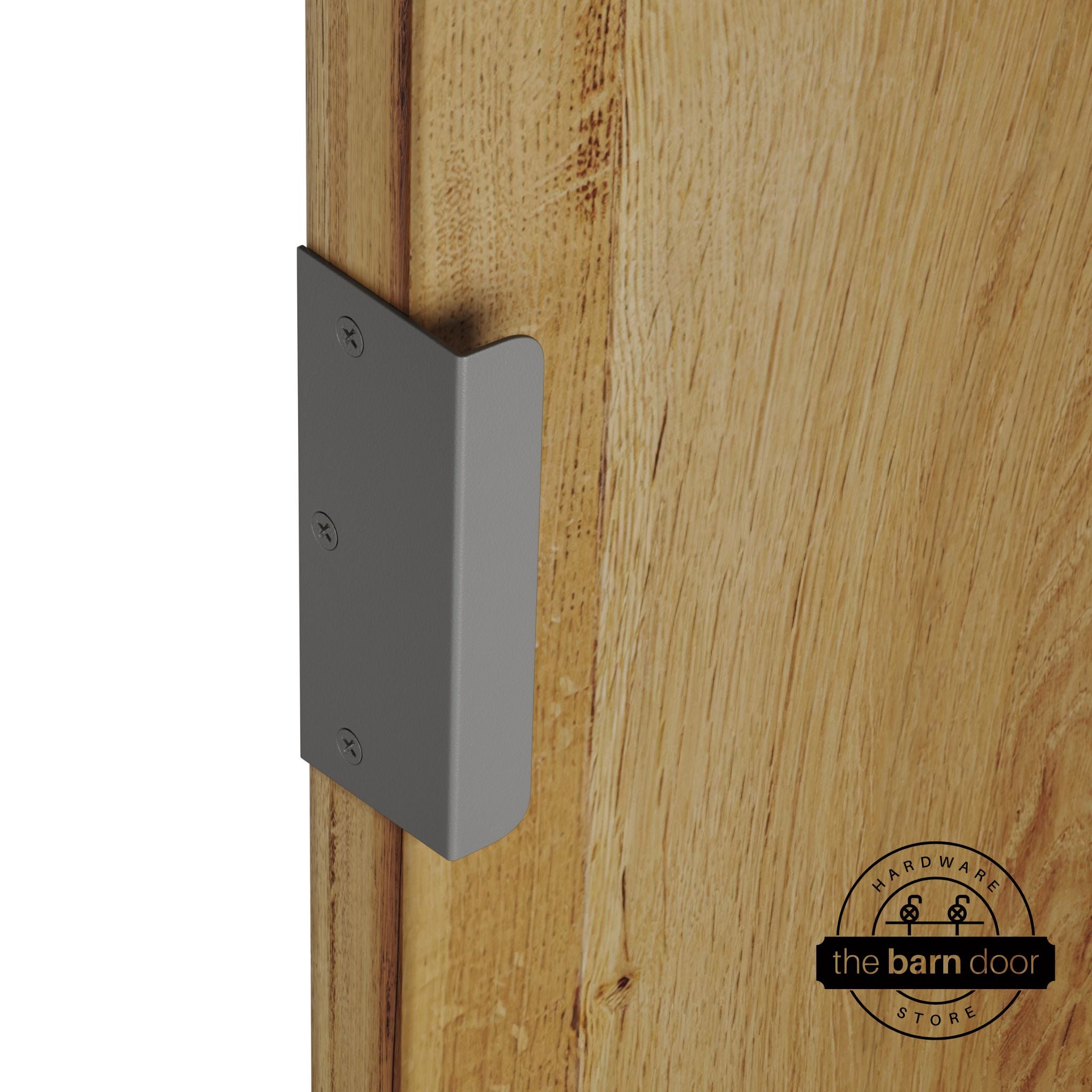 Flint gray sliding barn door edge pull handle on natural wood door edge