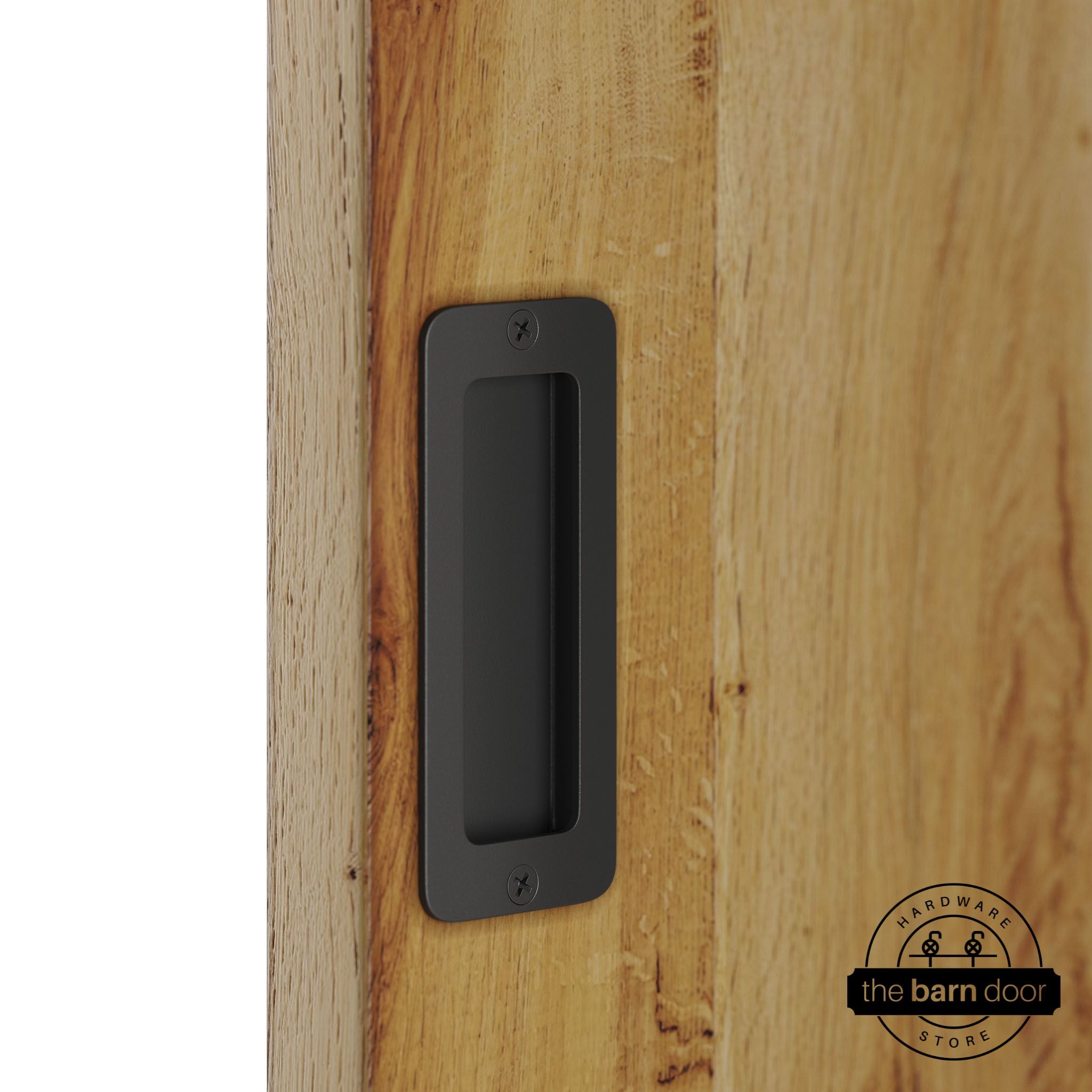 Matte black partial radius flush pull handle for sliding barn doors, installed on natural wood door panel