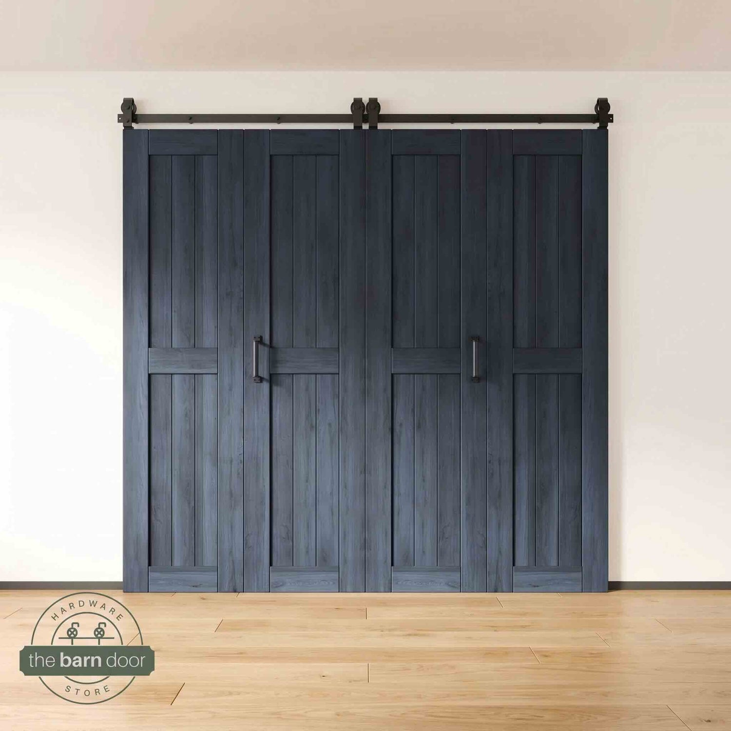 Four-panel bi-parting bifold barn door in a navy finish, fully closed in a modern entryway, showing the top-mount Matte Black track.