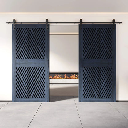 Two fully closed double barn doors in a navy finish, featuring a bold, intricate diamond slat pattern. The doors are installed with black sliding hardware against a white wall, revealing a modern linear fireplace in the space behind them.
