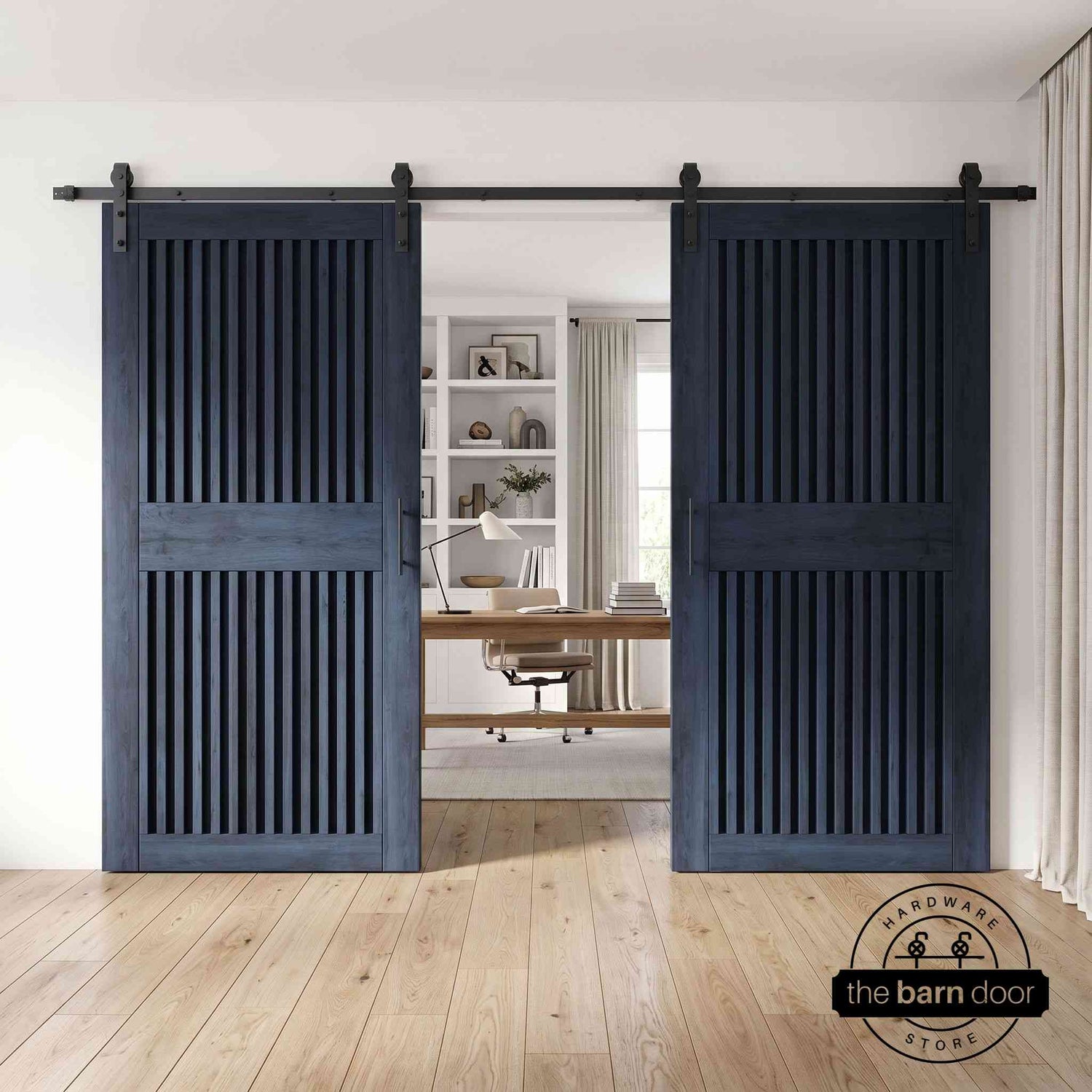 Pair of dark wooden barn doors with a modern fireplace in the background.