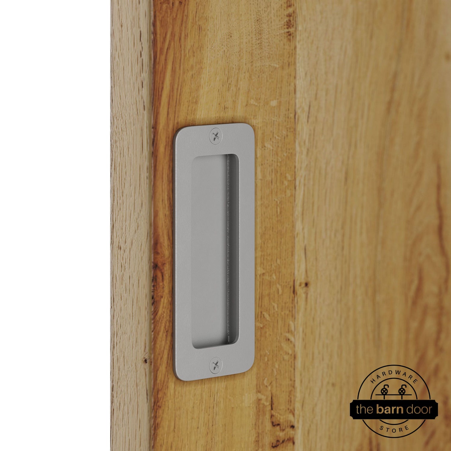 PC Chrome partial radius flush pull handle for sliding barn doors, installed on natural wood door panel