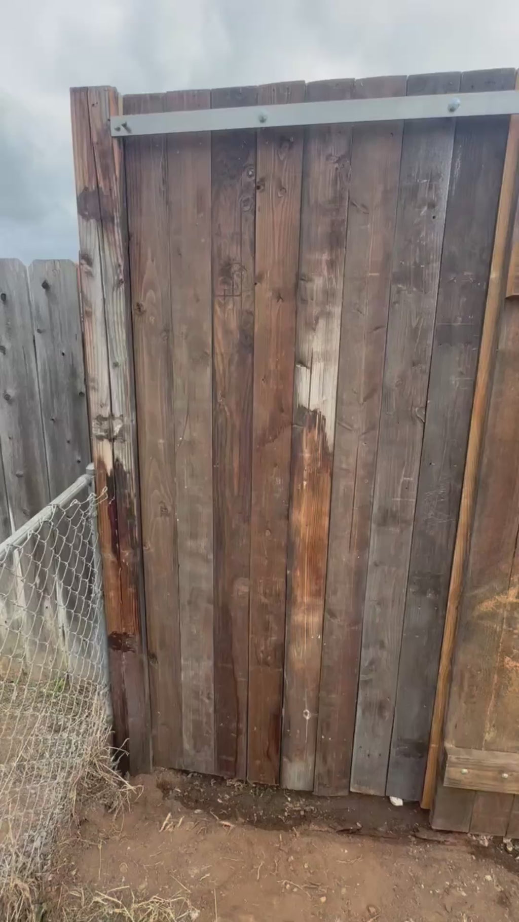 Exterior stainless steel barn door hardware used for a gate