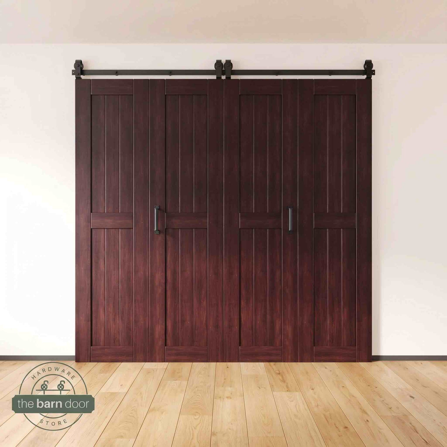 Four-panel bi-parting bifold barn door in a red mahogany finish, fully closed in a modern entryway, showing the top-mount Matte Black track.