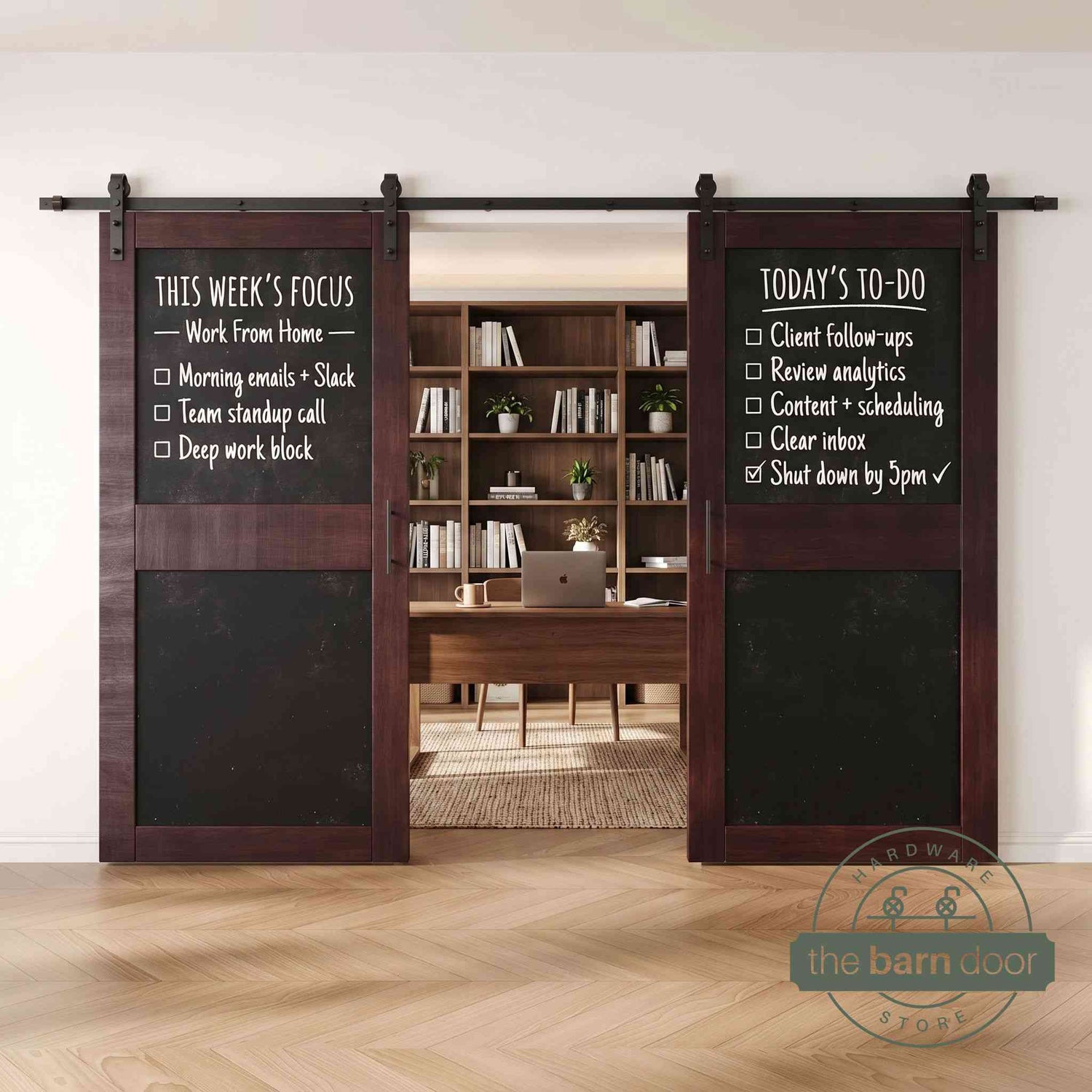 Red mahogany barn doors with black chalkboard surfaces in a modern interior setting
