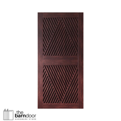 Close-up studio shot of a single red mahogany barn door panel featuring a striking slatted diamond geometric pattern.