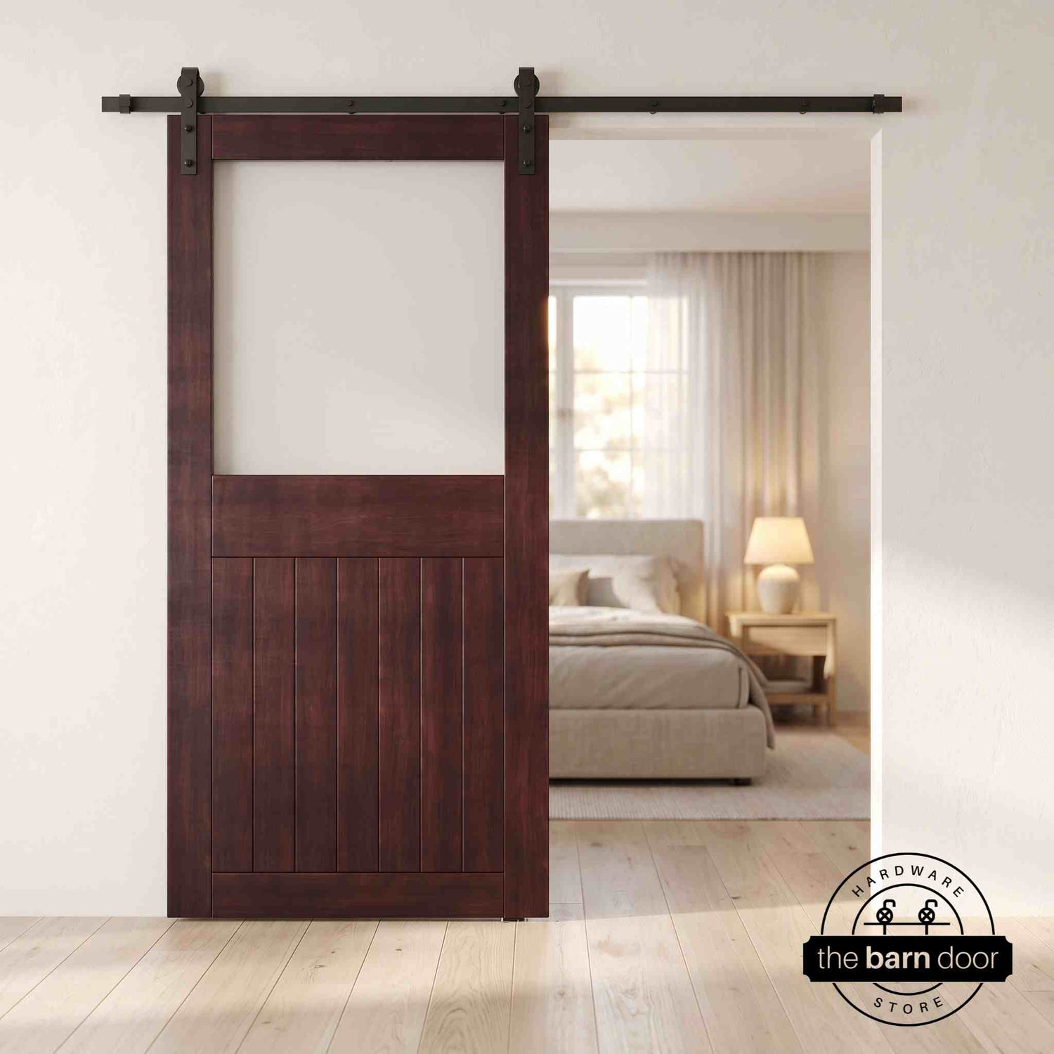 Red Mahogany sliding half-lite frosted glass barn door in a modern interior setting with a desk and shelves.