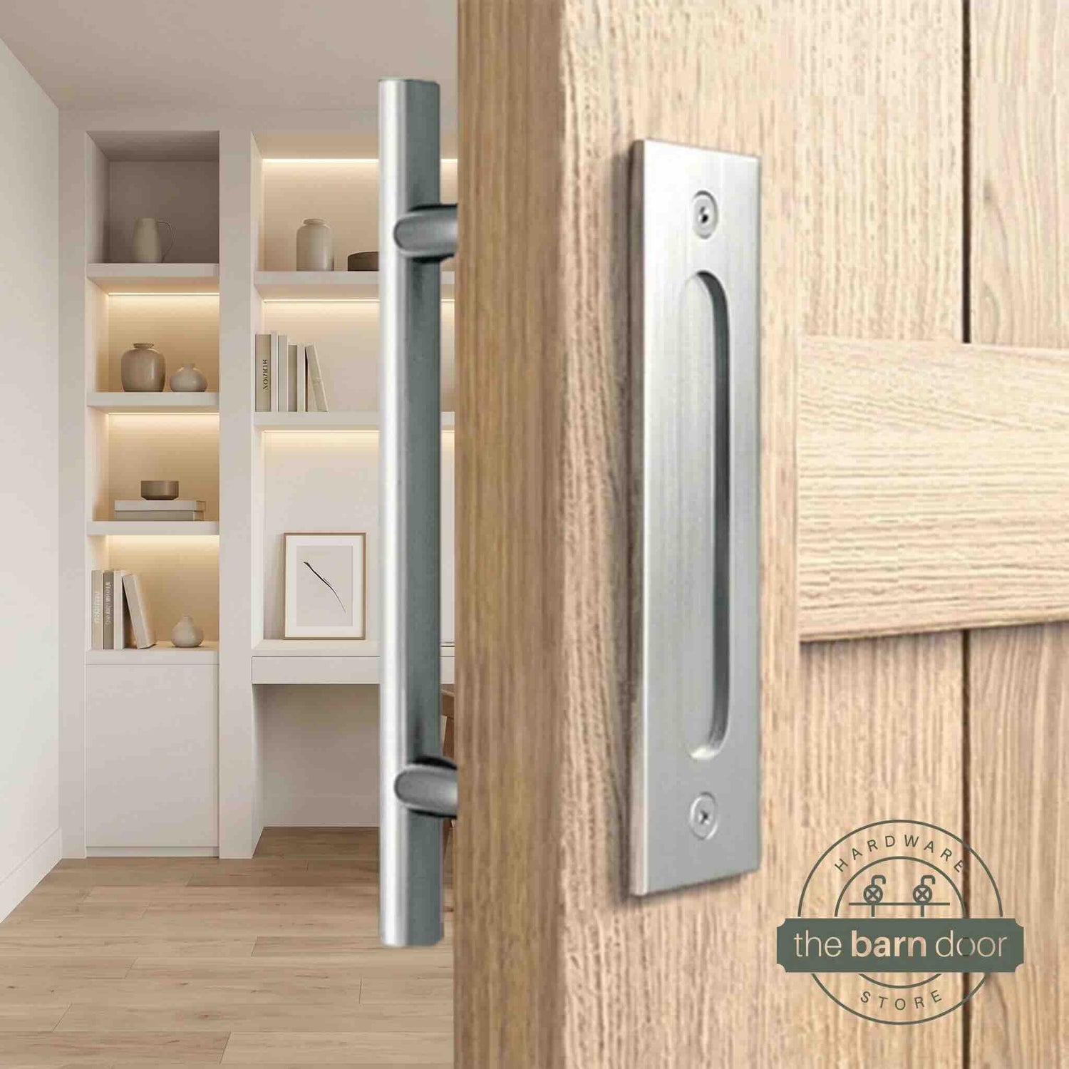 Stainless steel round pull and flush handle set installed on a natural wood sliding barn door