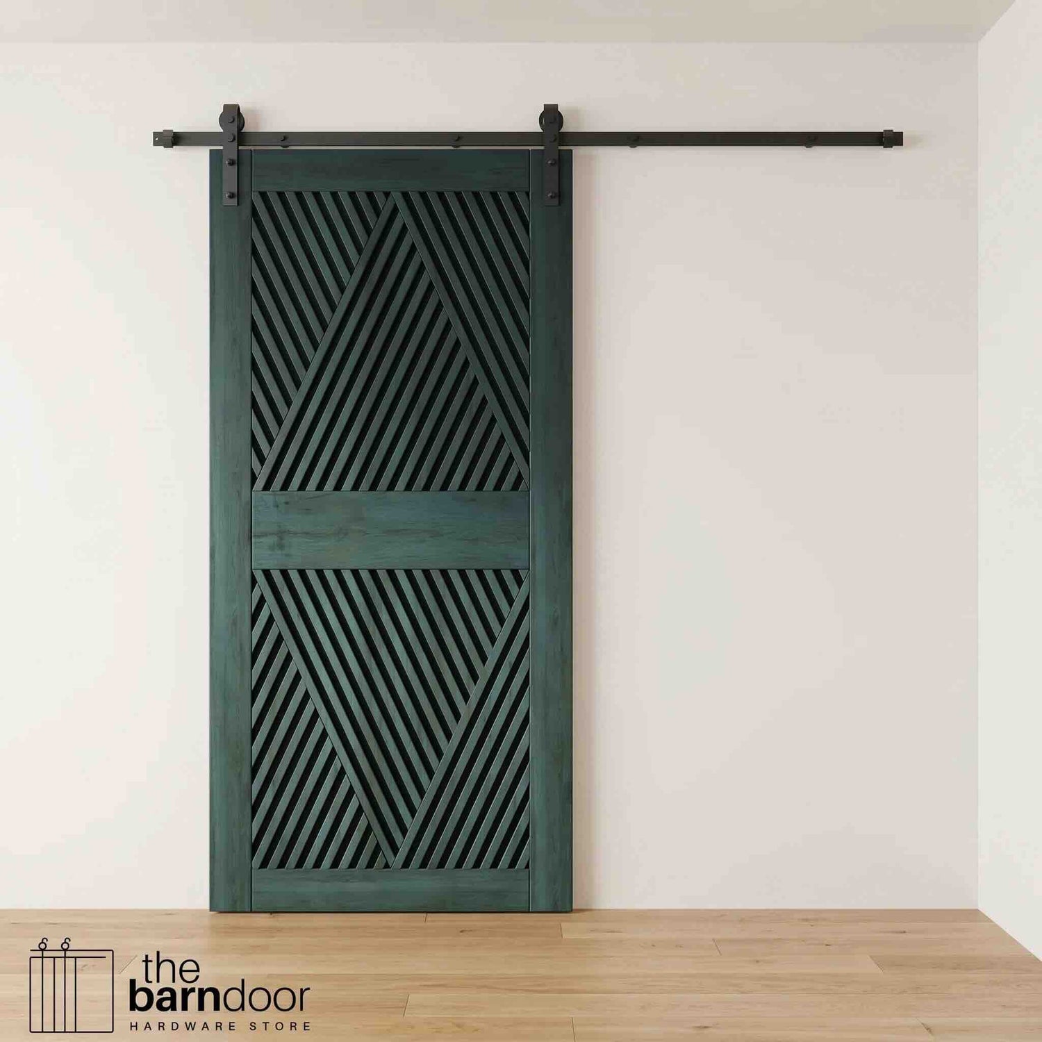 A modern royal pine barn door with an intricate geometric diamond pattern installed on a black track in a contemporary living space with a fireplace.