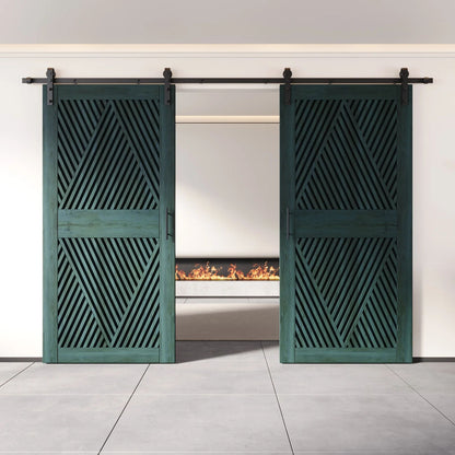 Two fully closed double barn doors in a royal pine finish, featuring a bold, intricate diamond slat pattern. The doors are installed with black sliding hardware against a white wall, revealing a modern linear fireplace in the space behind them.