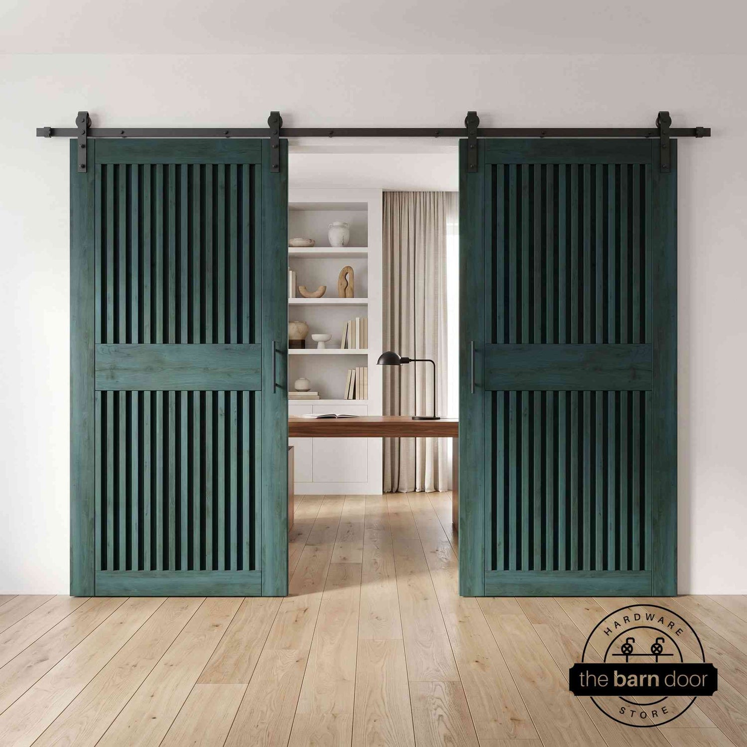 Green sliding barn doors with a fireplace in the background