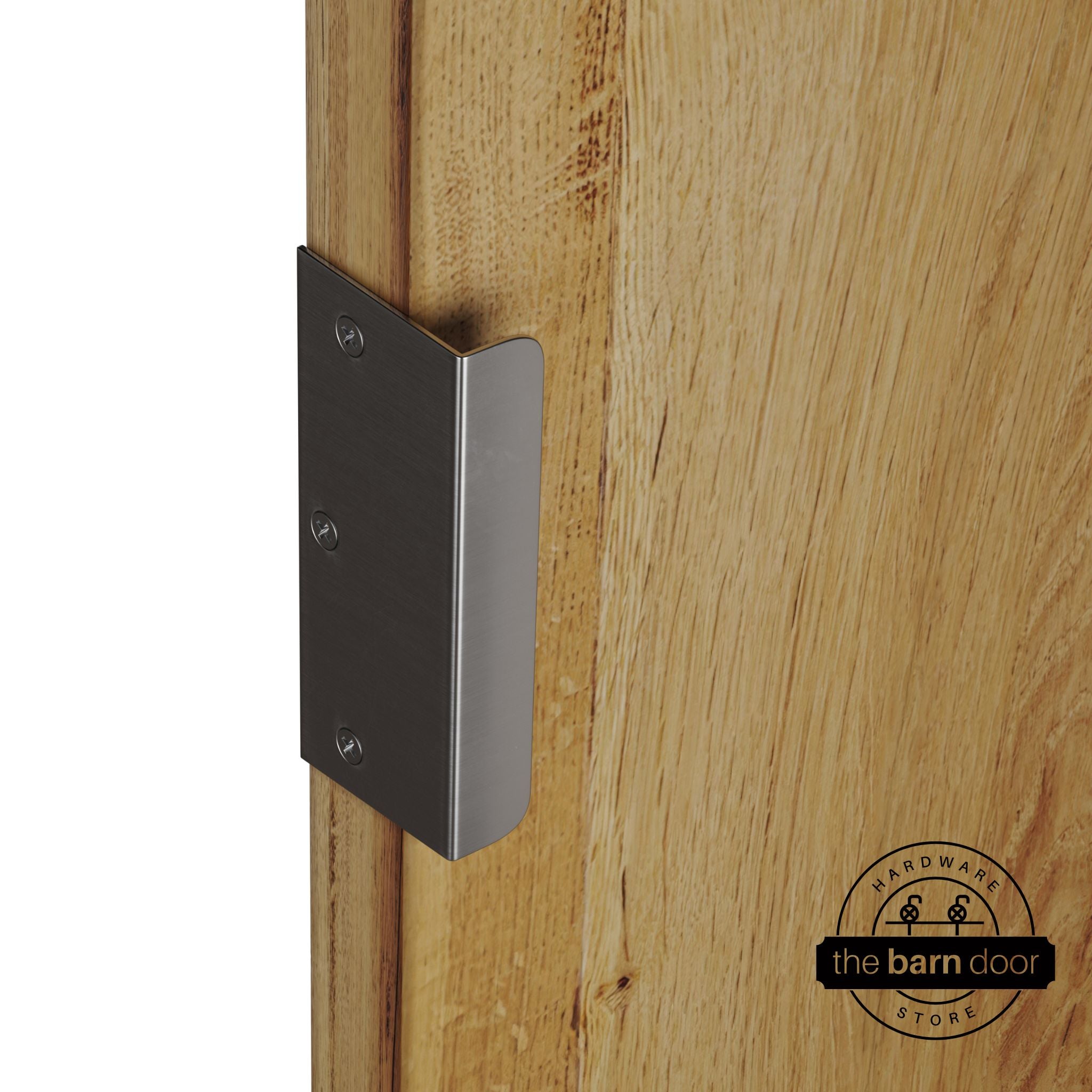 Stainless steel sliding barn door edge pull handle on natural wood door edge