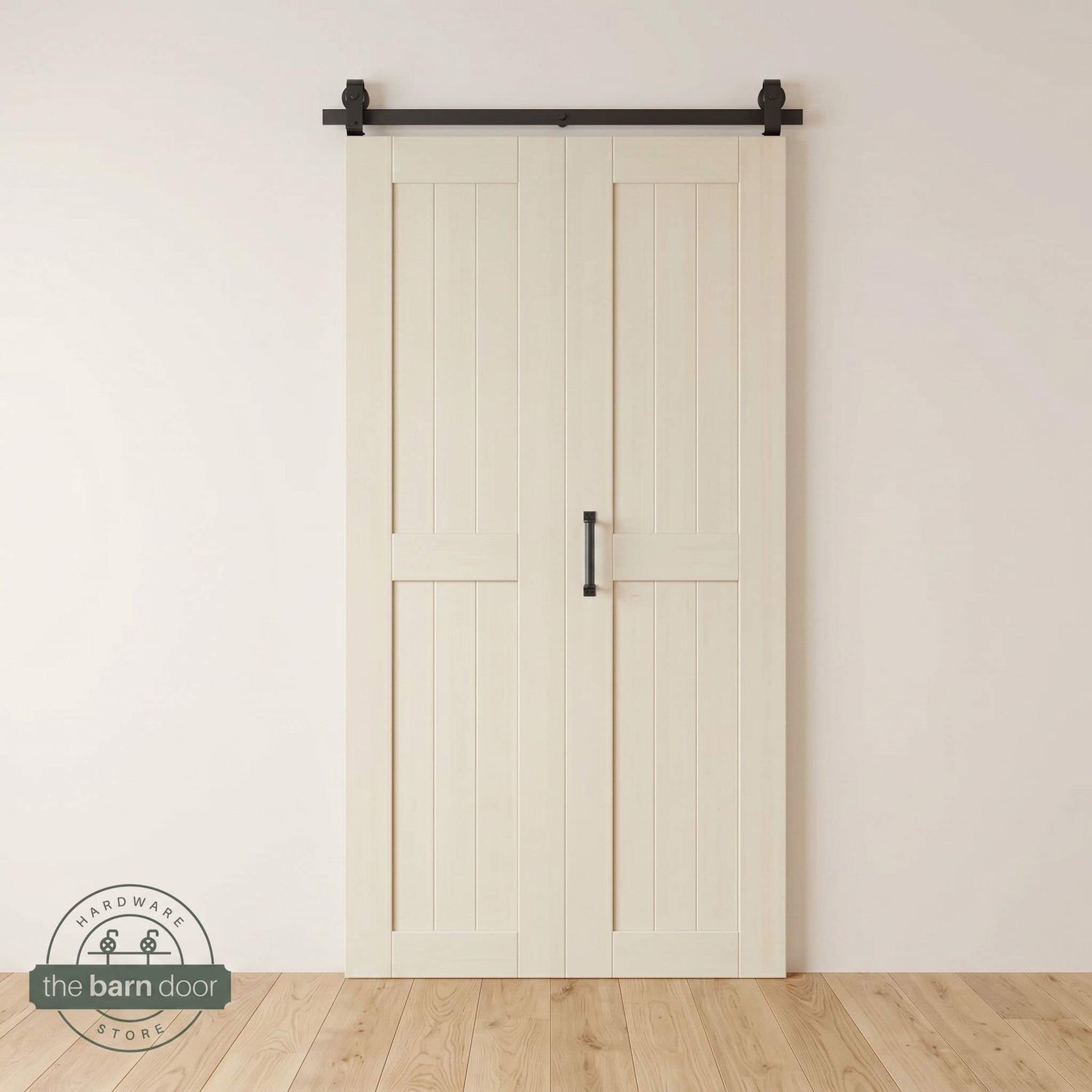 Two-panel bifold barn door in Tinsmith Gray finish, installed and fully closed in a modern interior, showing the top-mount Matte Black track.