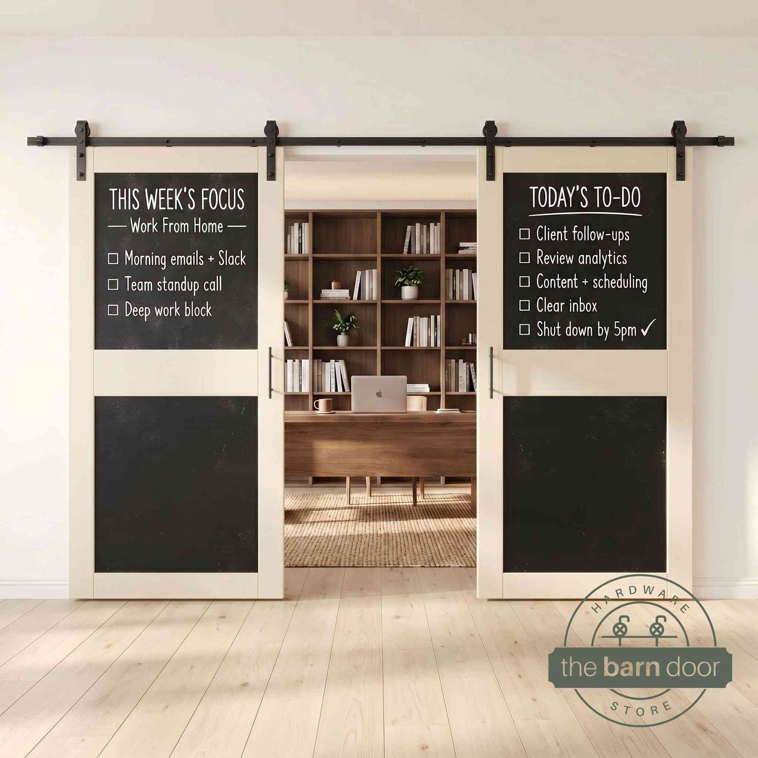 Tinsmith gray barn doors with black chalkboard surfaces in a modern interior setting