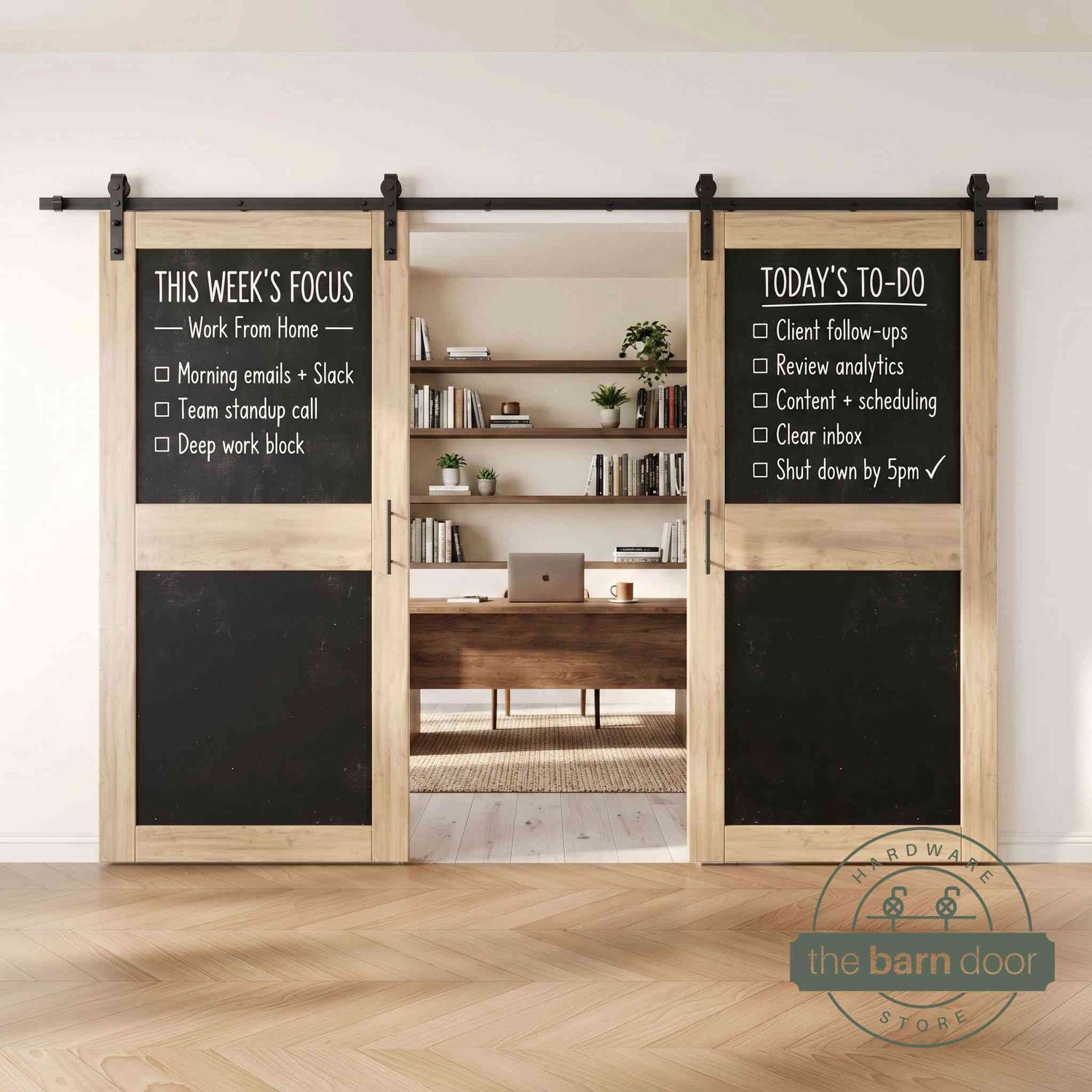 Unfinished barn doors with black chalkboard surfaces in a modern interior setting