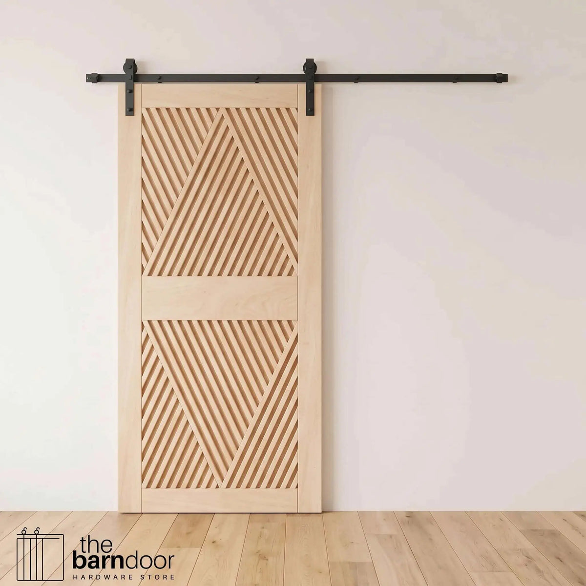 Unfinished diamond slat sliding barn door with matte black track and hangers in a white room with light oak floors