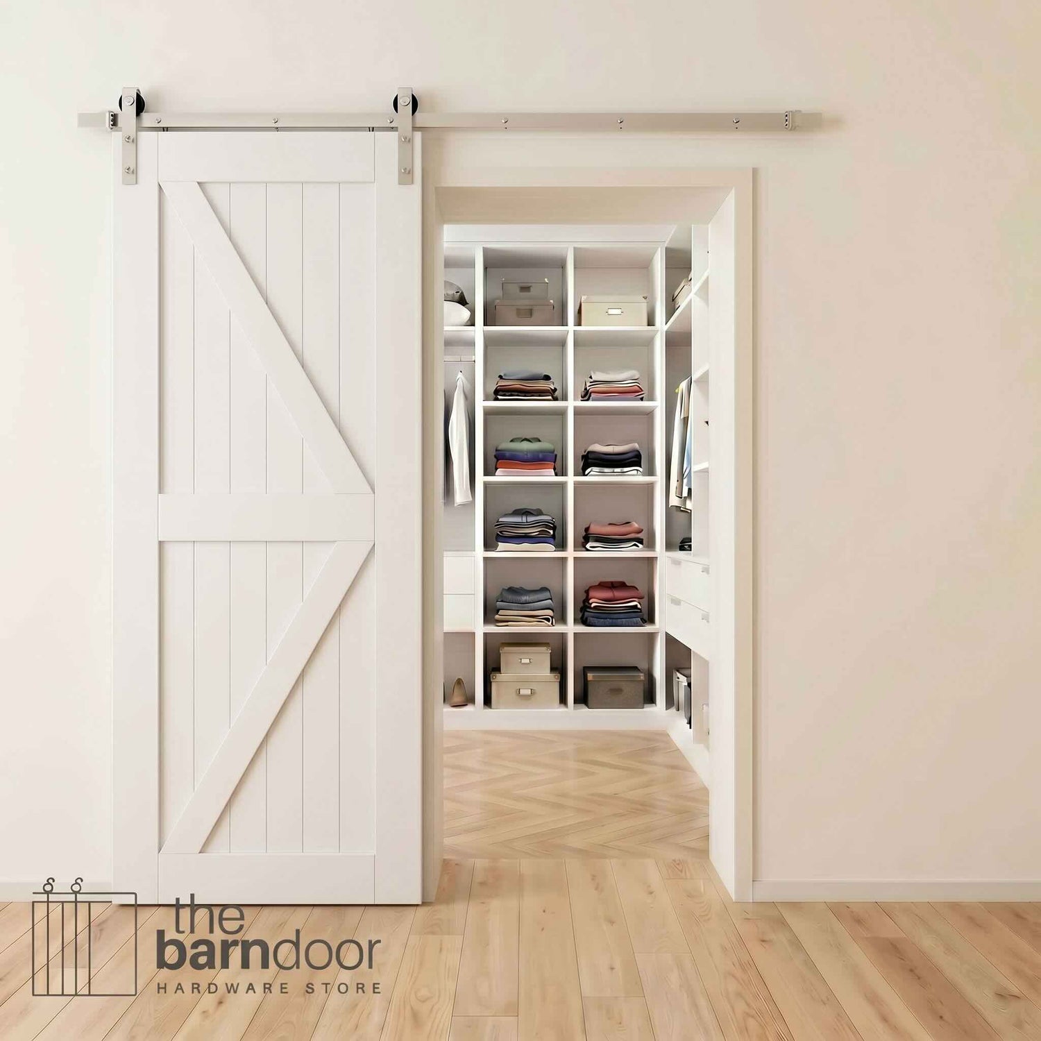 Brushed nickel barn door hardware kit on a white K-brace barn door, modern farmhouse style.