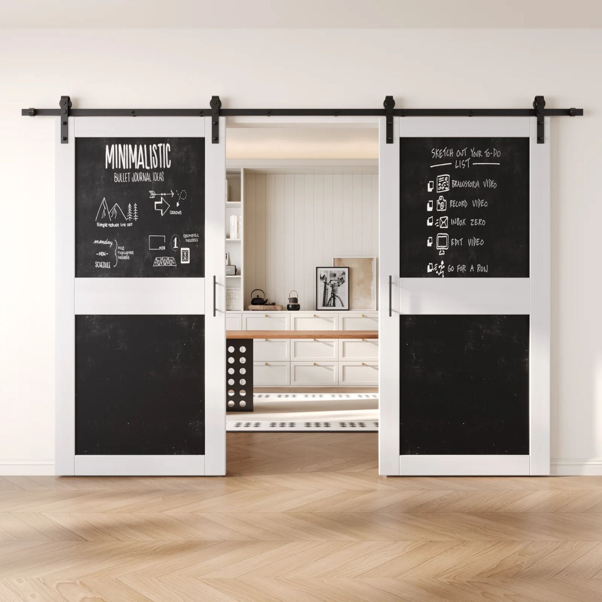 White barn doors with black chalkboard surfaces in a modern interior setting